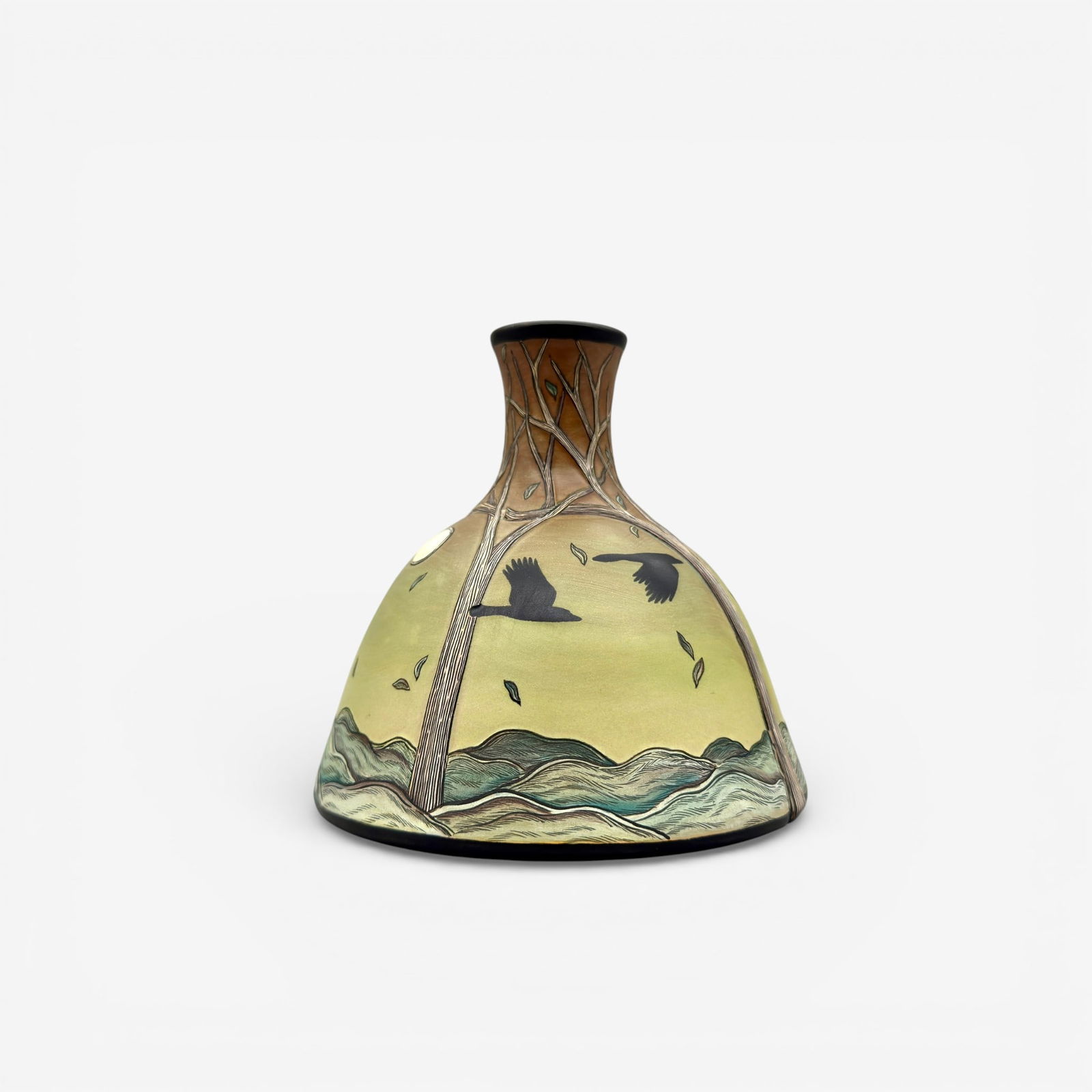 Terri Kern "Vellum" glaze, crows and full moon, 2011: Carved and painted Terri Kern "Vellum" glaze vase, four panels separated by trees, panels containing crows, falling leaves and a full moon. Signed TS Kern 2011. Height 4 5/8 inches.