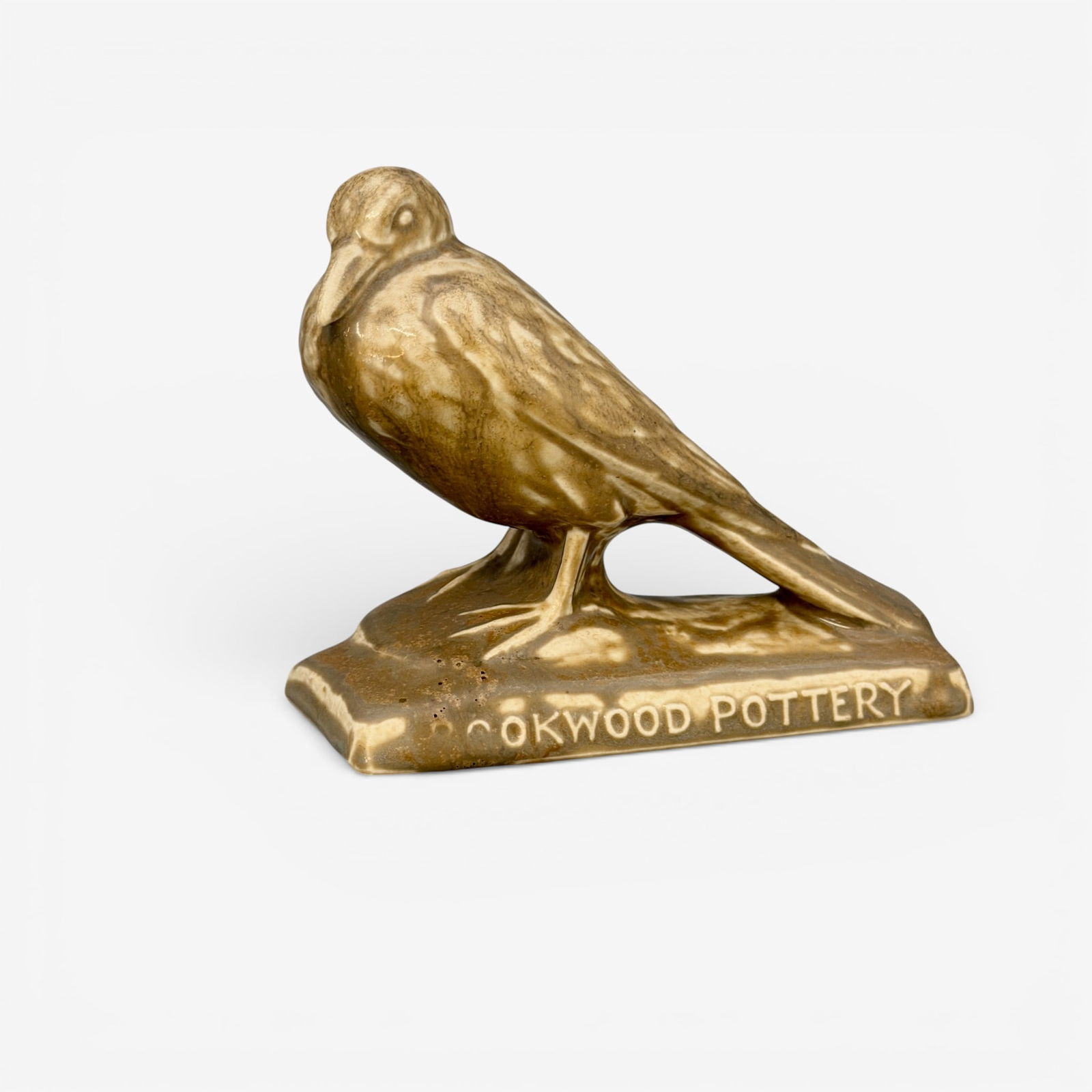 Rookwood "Fine Tiles" paperweight , tan, 1928: Uncommon Rookwood "Fine Tiles' paperweight in tan mat glaze, marked Rookwood Pottery Fine Tiles on plinth. Impressed Rookwood logo, XXVIII shape number 2921. Height 4 inches.