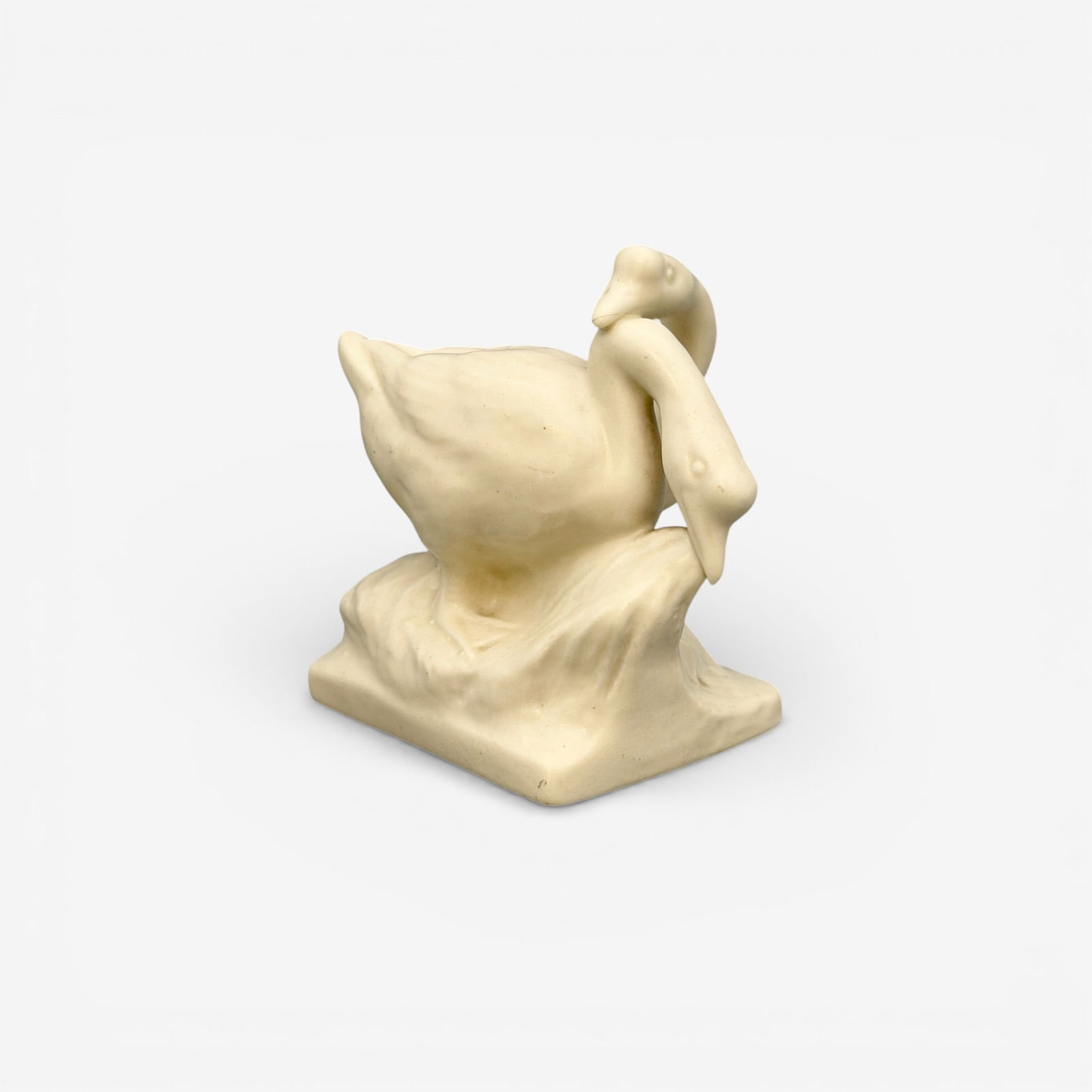 Rookwood Double Goose paperweight, 1935: Rookwood Double Goose paperweight in white mat. Impressed Rookwood logo, XXXV, Shape number 1855. Height 4 1/8 inches.
