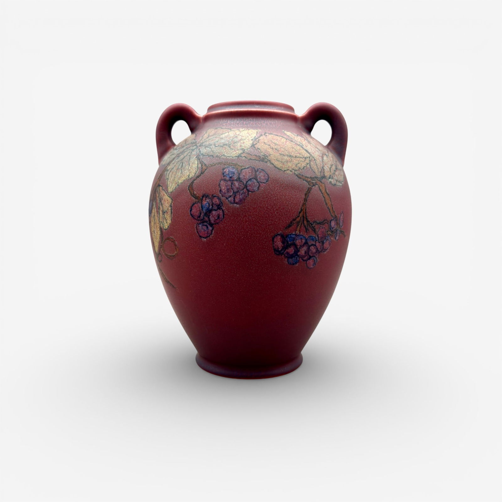 Rookwood Decorated Mat, leaves, berries, Covalenco.: Colorful twin handled Decorated Mat vase with leaves and berries done by Catherine Covalenco in 1924. Decorated nicely on both sides. Impressed Rookwood logo, XXIV, shape number 2640 E. Painted