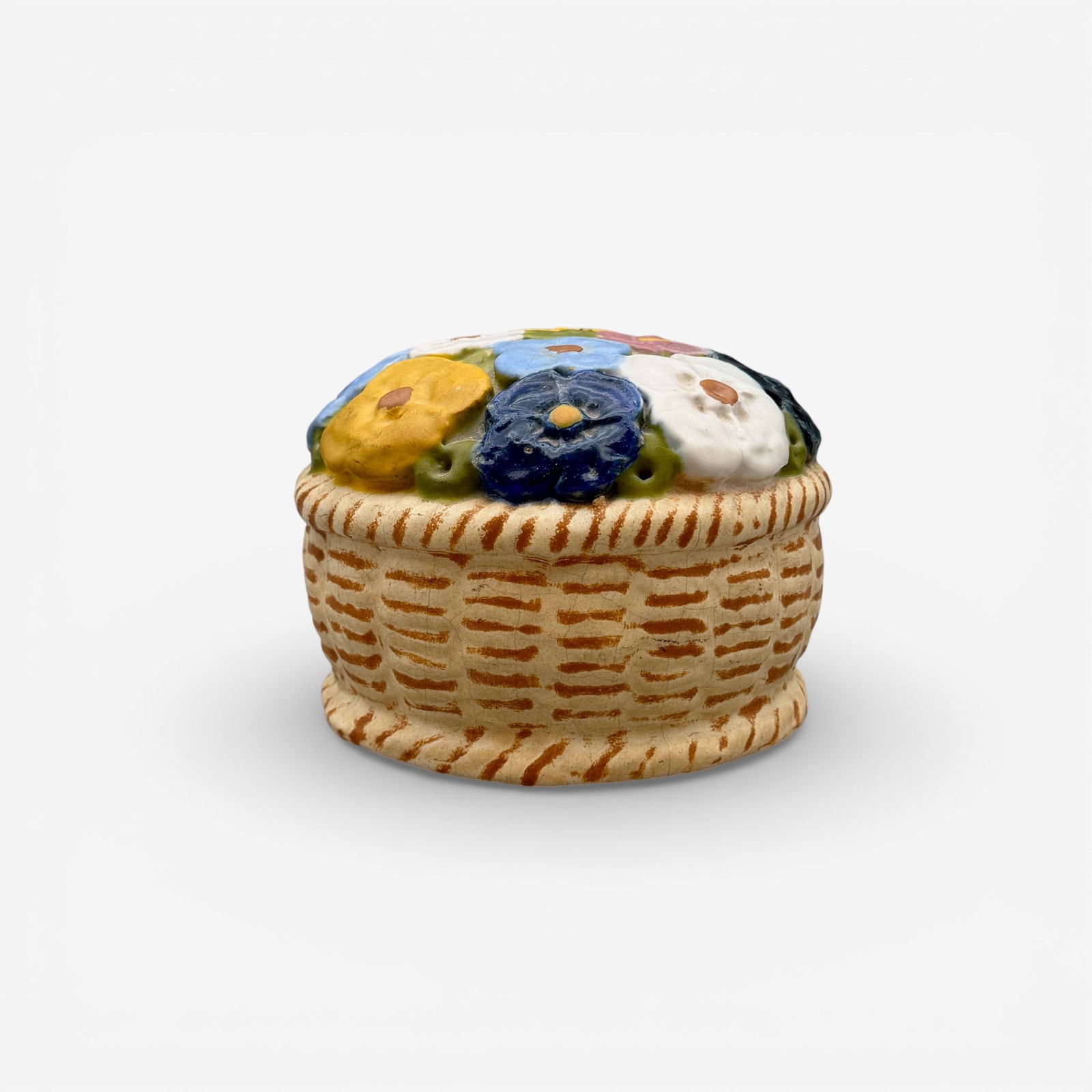 Teco polychromed "Flower Basket" doorstop.: Teco polychromed "Flower Basket" door stop. Impressed 1925 on underside. Height 4 1/4 inches.