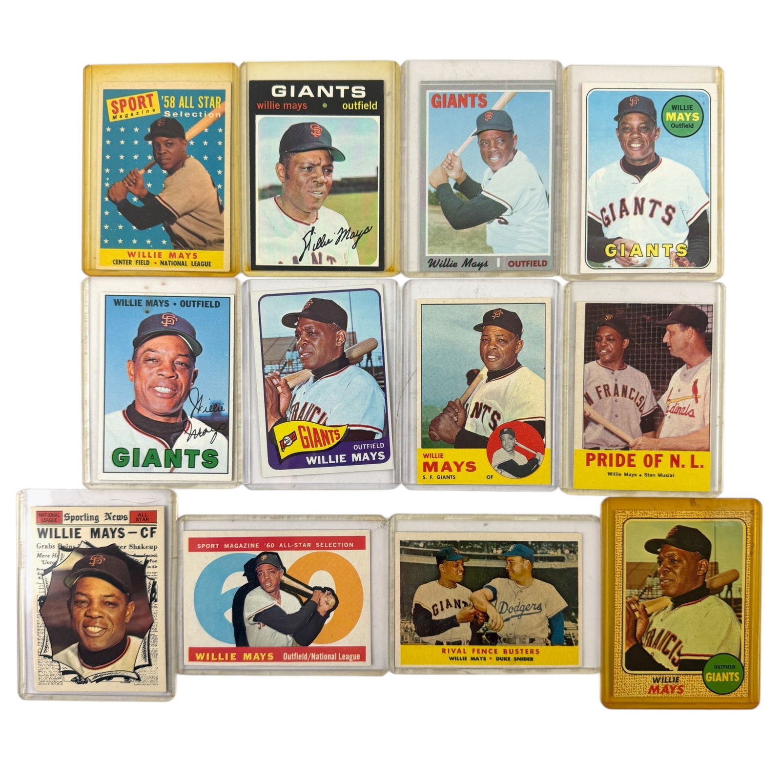 Willie Mays Grouping of Baseball Cards: A group of 12 cased Willie Mays cards, 50's-70s.