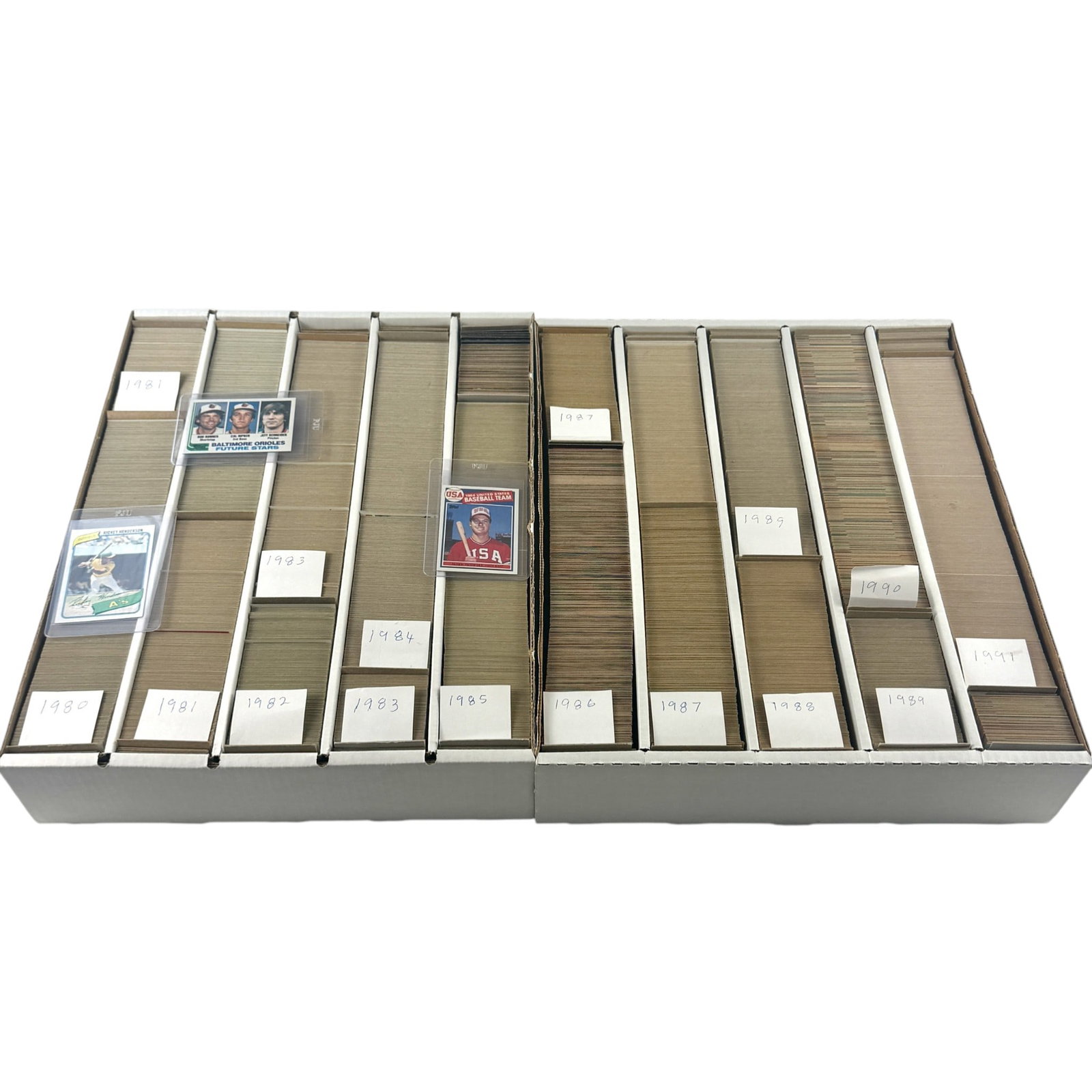 Virtually Complete 1980-1991 Topps Baseball Sets: Including the Rickey Henderson 1980 rookie, as well as a clean copy of the 1982 Cal Ripken "Future Stars" card, and also McGuire 1985 "USA Baseball Team" rookie. Missing the Bo Jackson rookie, but lar