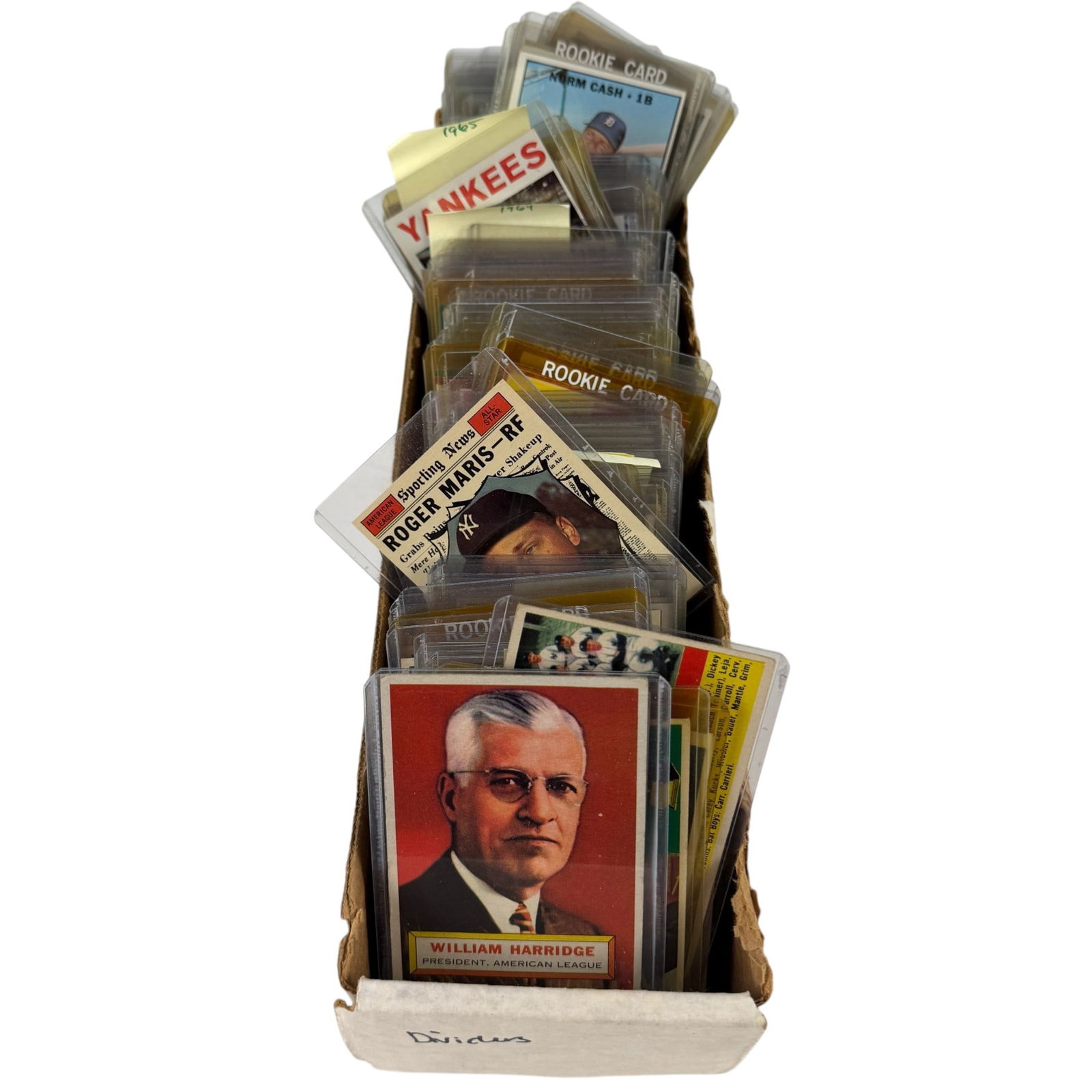 Large Group of Topps 1950s-1960s Key Baseball Cards: A box of 124 Topps baseball cards in top loaders, the majority 1960s, as well as a pair of 1956 William Harridge Cards. Numerous Roger Maris, Sandy Koufax, Pete Rose, Ernie Banks, Team cards, and Rook