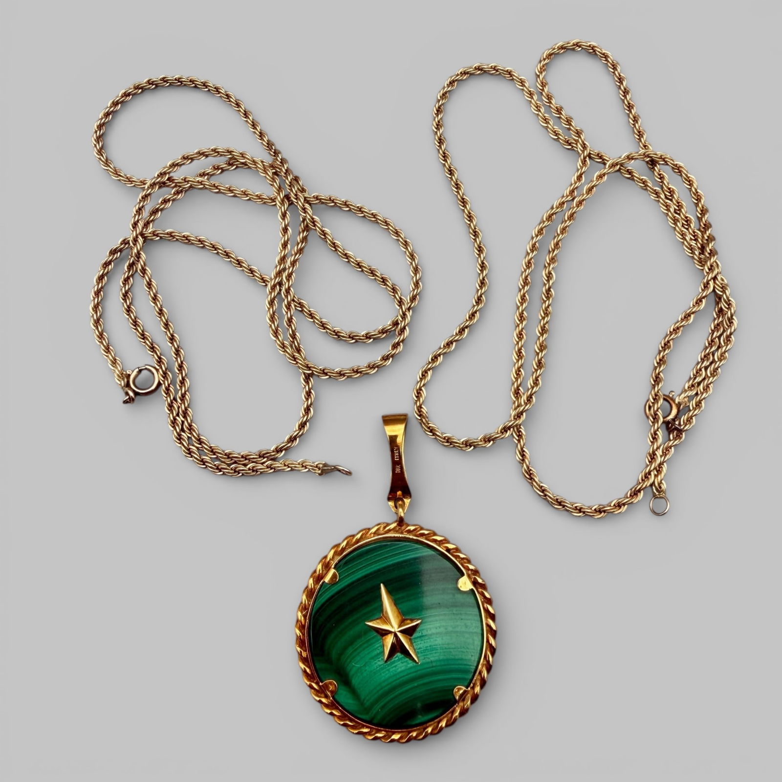 18K Italian Gold Malachite Scale/Star Pendant: Accompanied by two gold filled rope chains, the malachite pendant is wrapped in 18k Italian gold. Pendant clasp is marked for 18k gold. Pendant weight: .81 troy ounces
