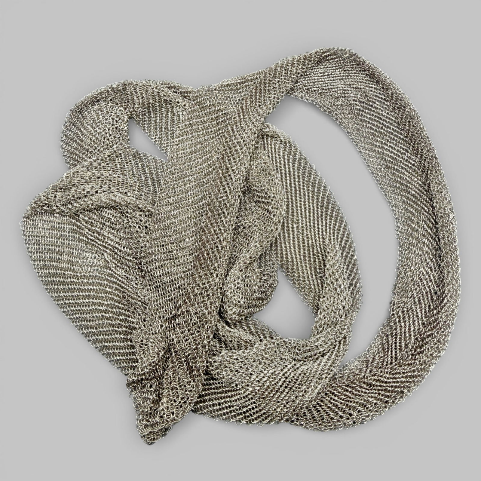 Tiffany and Co. Elsa Peretti Sterling Mesh Scarf Necklace: Stamped with T. and Co., 925 and Peretti. Mesh scarf necklace weighing at 2.16 troy ounces of 925 sterling silver. 36" length