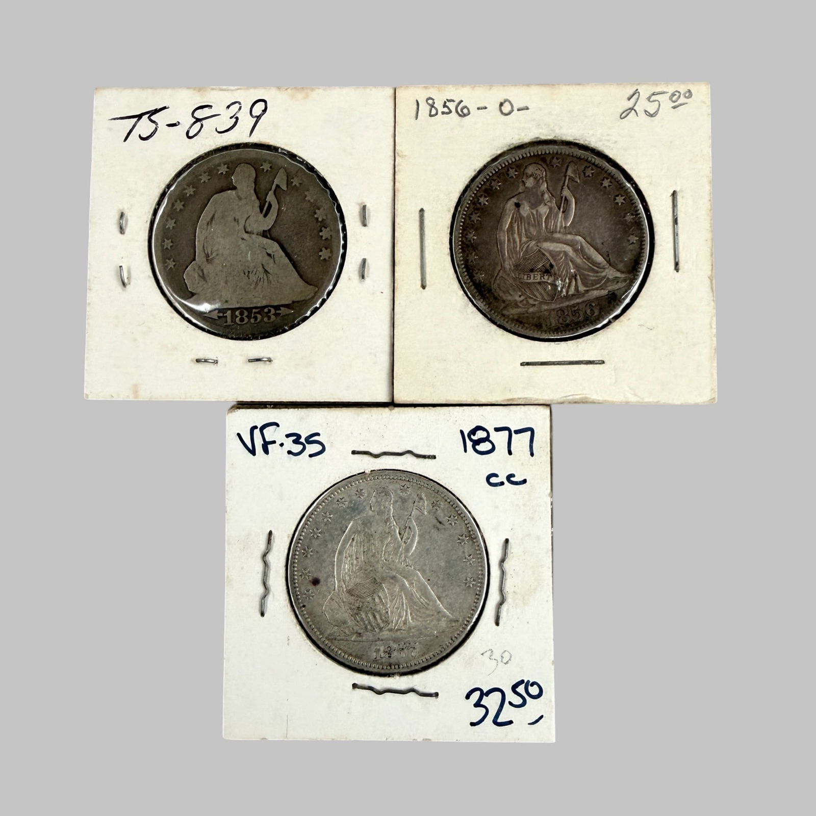 Group (3) Silver Seated Liberty Half Dollar: 1865-O Silver Seated Liberty Half Dollar-Condition, Fine.; 1853-O Silver Seated Liberty Half Dollar-With Arrows and Rays. Condition, About Good.; 1877-CC Silver Seated Liberty Half Dollar-Condition,
