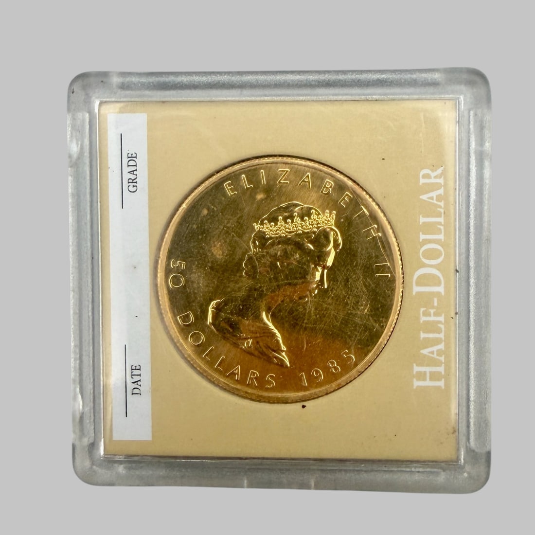 Canada Elizabeth II Fifty Dollar Gold: Dated 1985. 1 oz .9999 fine gold. Mint BU.