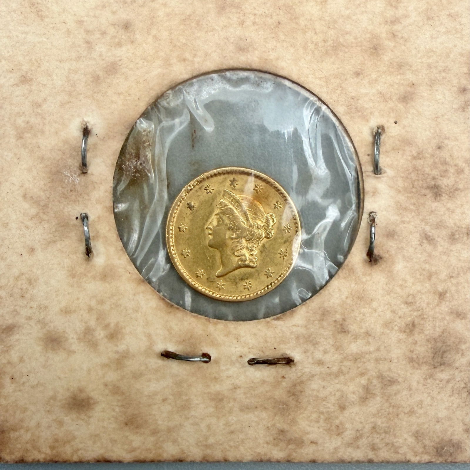 U.S. $1 Gold Coronet: 1849 Open Wreath, Philadelphia. Condition Fine.