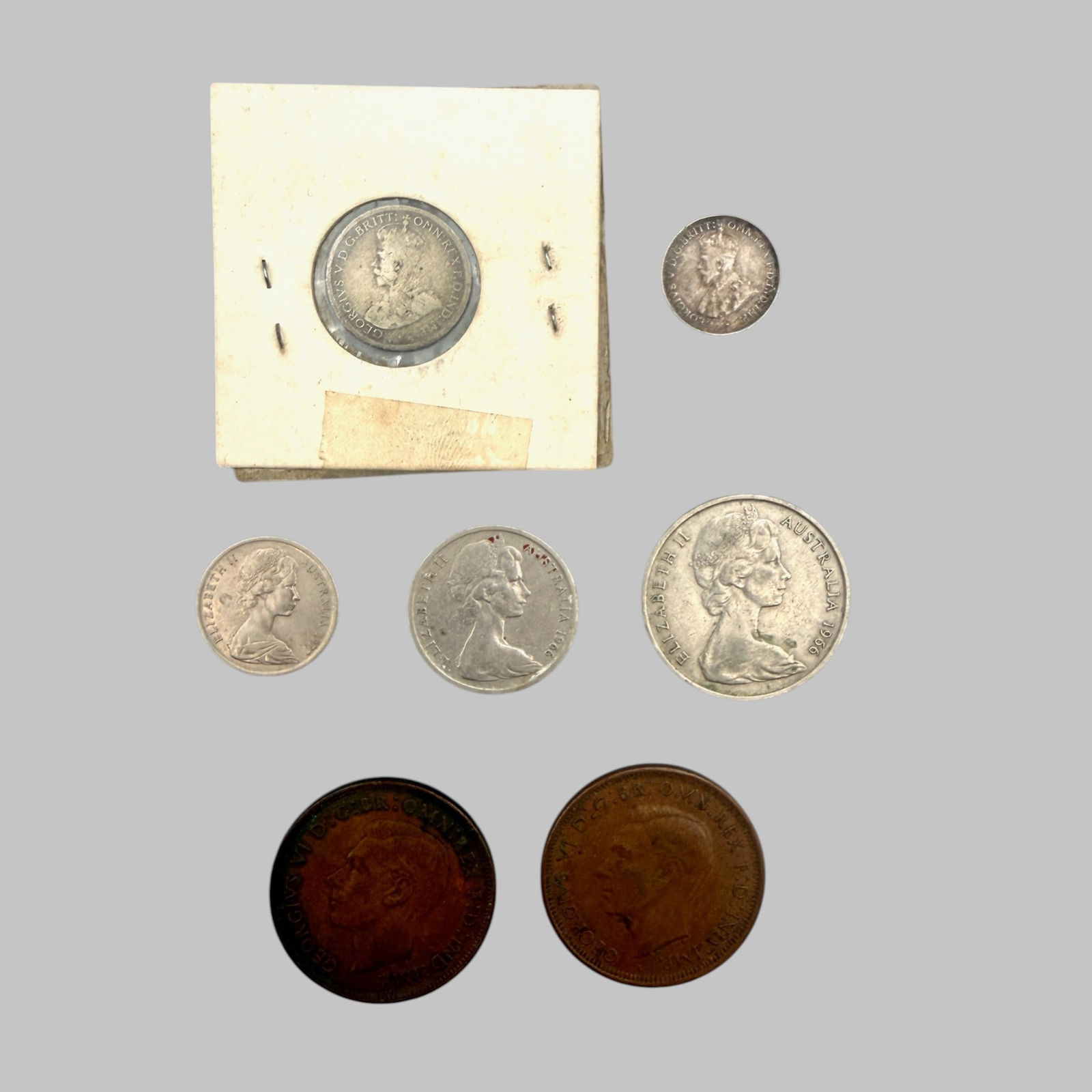 Group of Assorted Australian Coins: Australia 1923 Silver Six Pence (VG); Australia 1928 Silver Three Pence (Fine); Five coins including 1966 20c, 1966 10c, 1977 5c, 1938 & 1942 Penny (VG).
