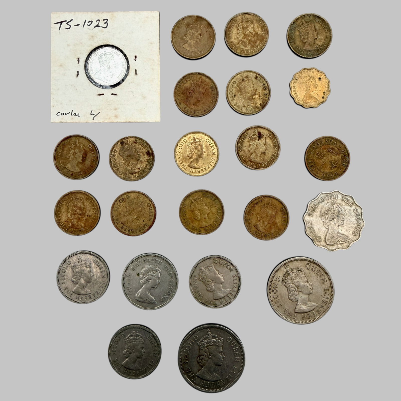 Group of Assorted Hong Kong Coins: Includes a 1904 Edward VII silver 10 Cents (BU) and a group of 22 Hong Kong coins dated 1959â 1986 including 2-dollar, 50-cent, 20-cent and 10-cent pieces.