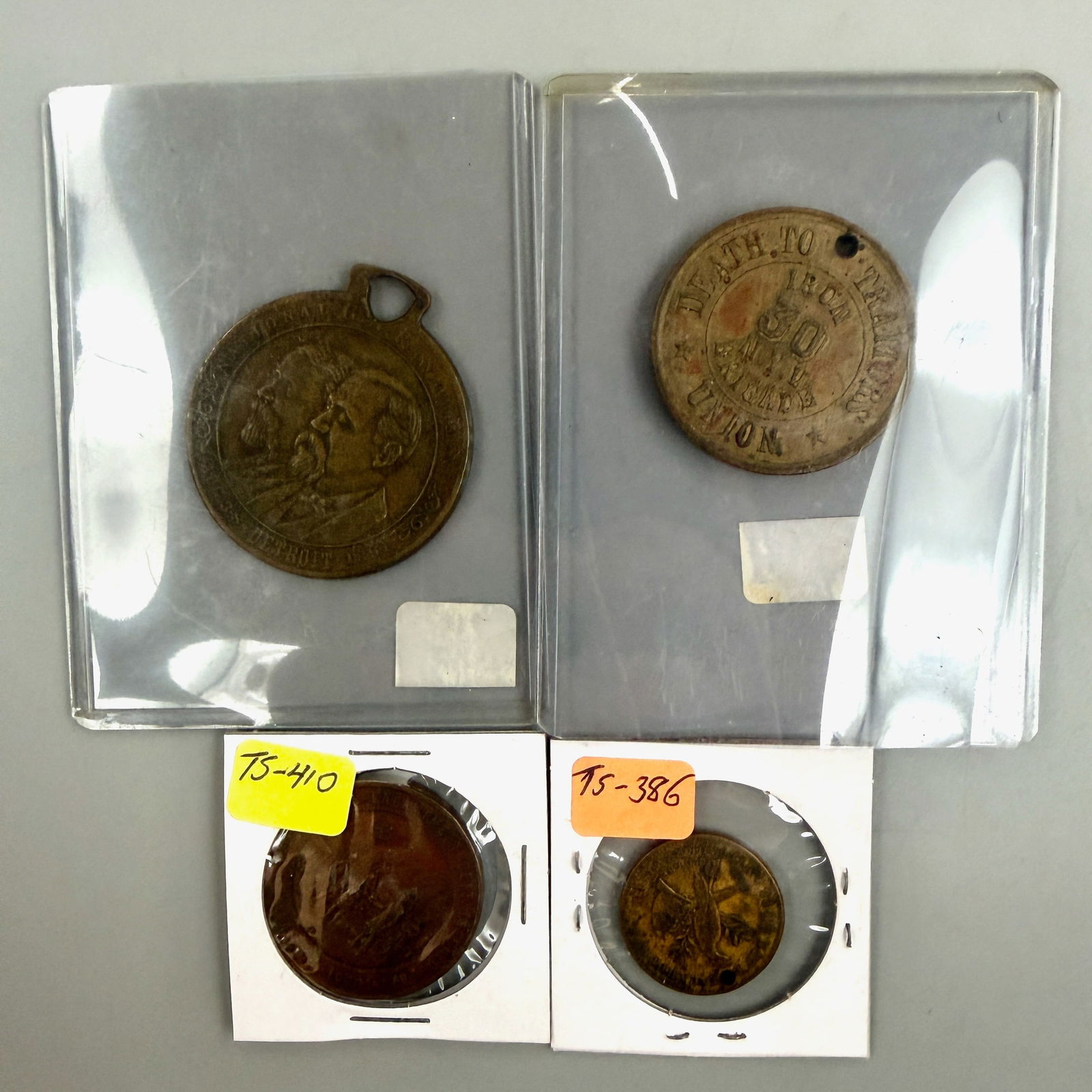 Group of Grand Army of the Republic (GAR) Medals: Four GAR medals: 1891 Detroit Encampment watch fob; 1889 Milwaukee Old Abe medallion (holed); 1903 Ohio Encampment medal; and 30th N.Y. Iron Brigade medal (holed as made). Very Good to Excellent.