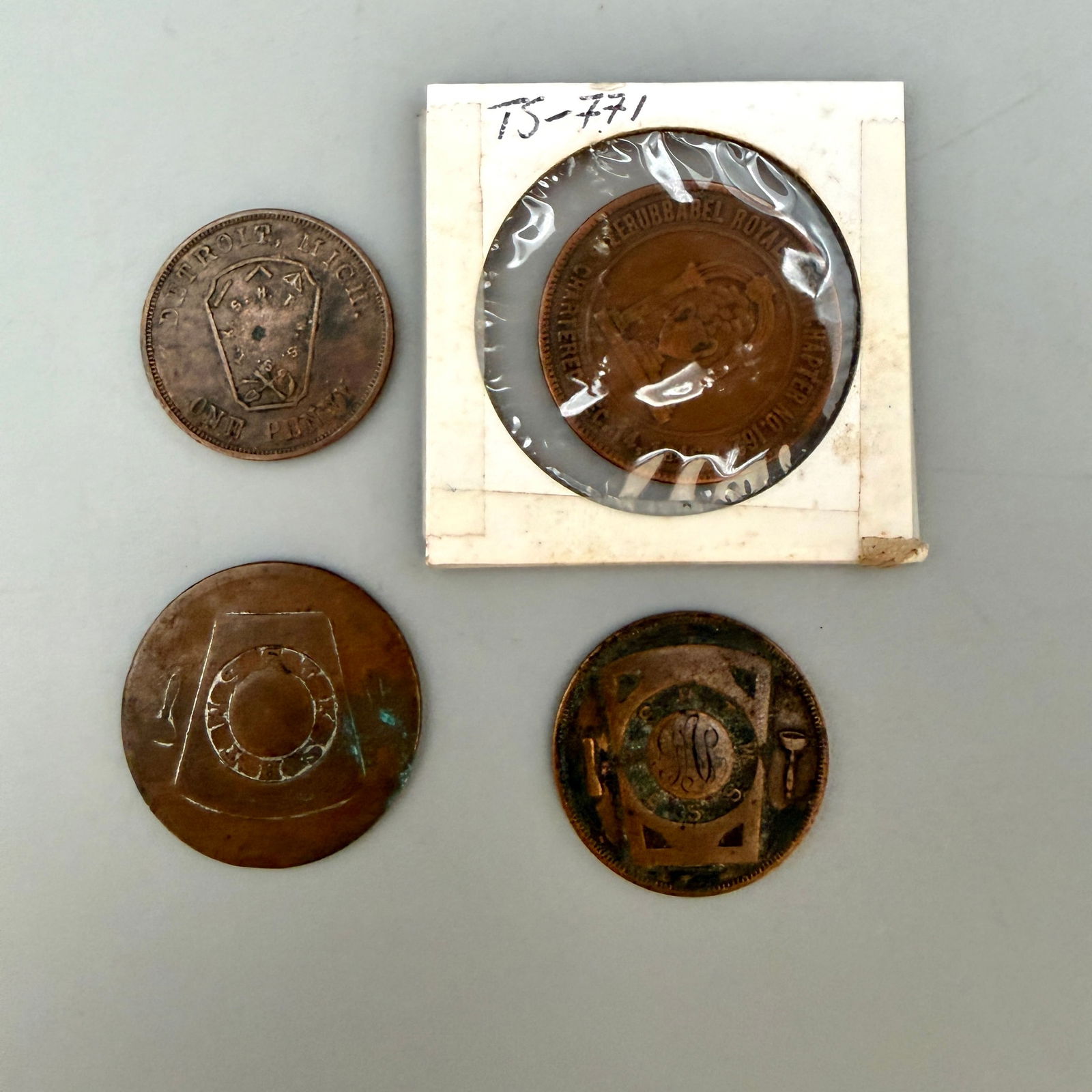 Group of Masonic Chapter/Mark Pennies: Multiple Masonic chapter/mark pennies including Hamilton Canada; Buffalo N.Y.; Detroit Monroe Chapter No.1 (1818); Pittsburgh Zerubbabel Chapter No.162; Norwalk Ohio Huron Chapter No.7; plus additiona