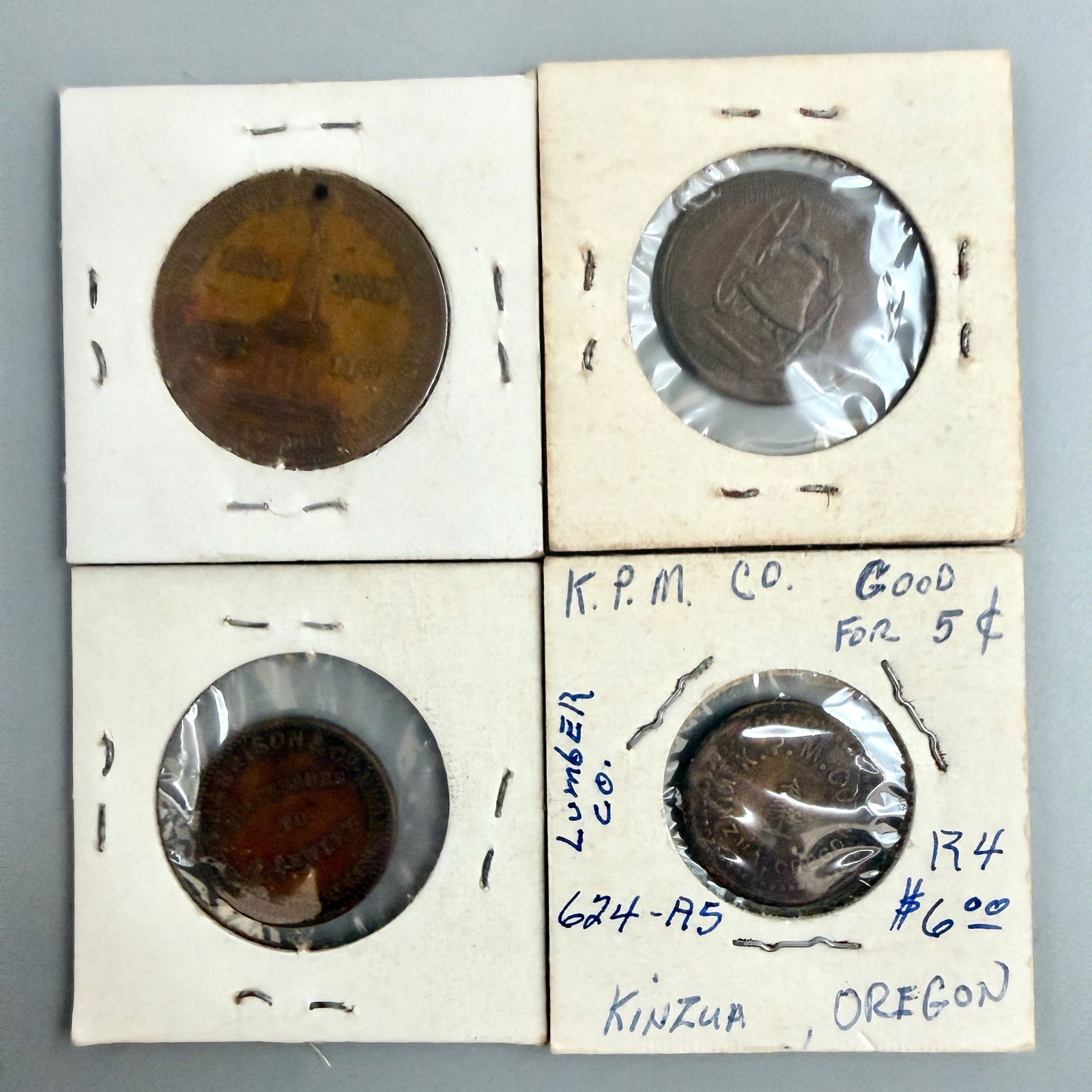 Group (4) Assorted Merchant Tokens - 6