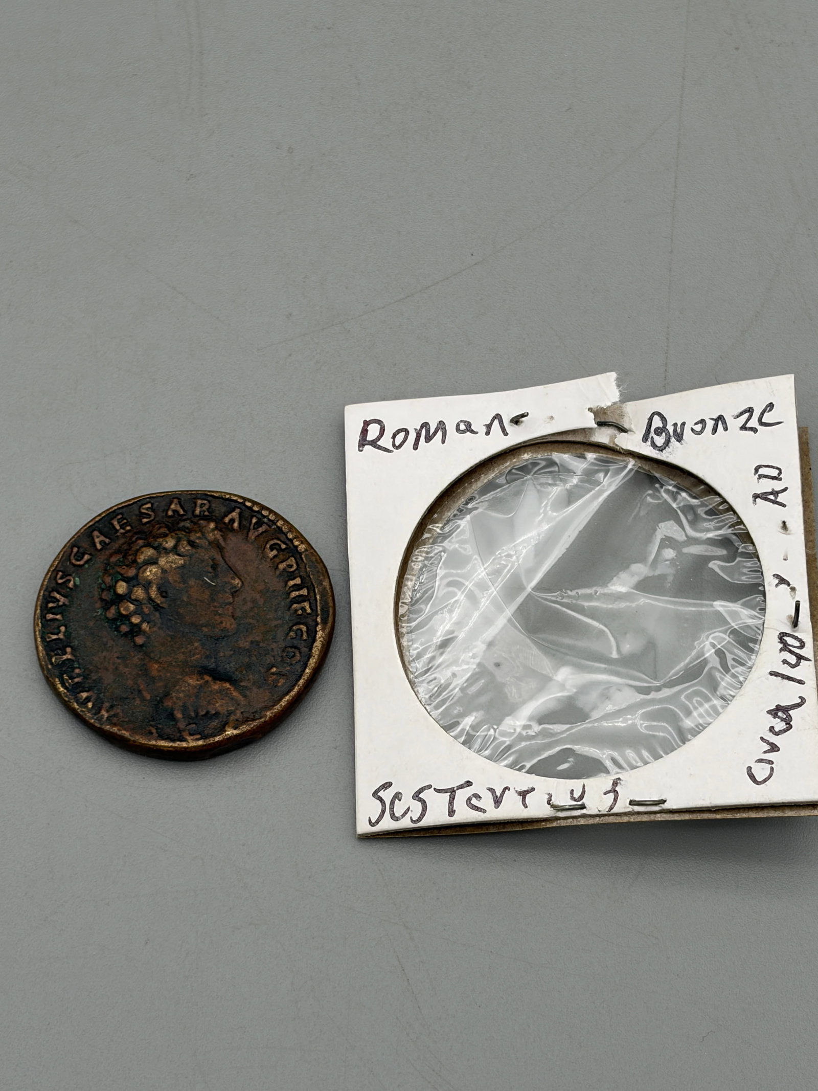 Rome Bronze Sestertius Antoninus Pius & Marcus Aurelius: Roman bronze coin showing Antoninus Pius obverse and Marcus Aurelius Caesar reverse (circa 140 A.D.). Condition Fine to VG.