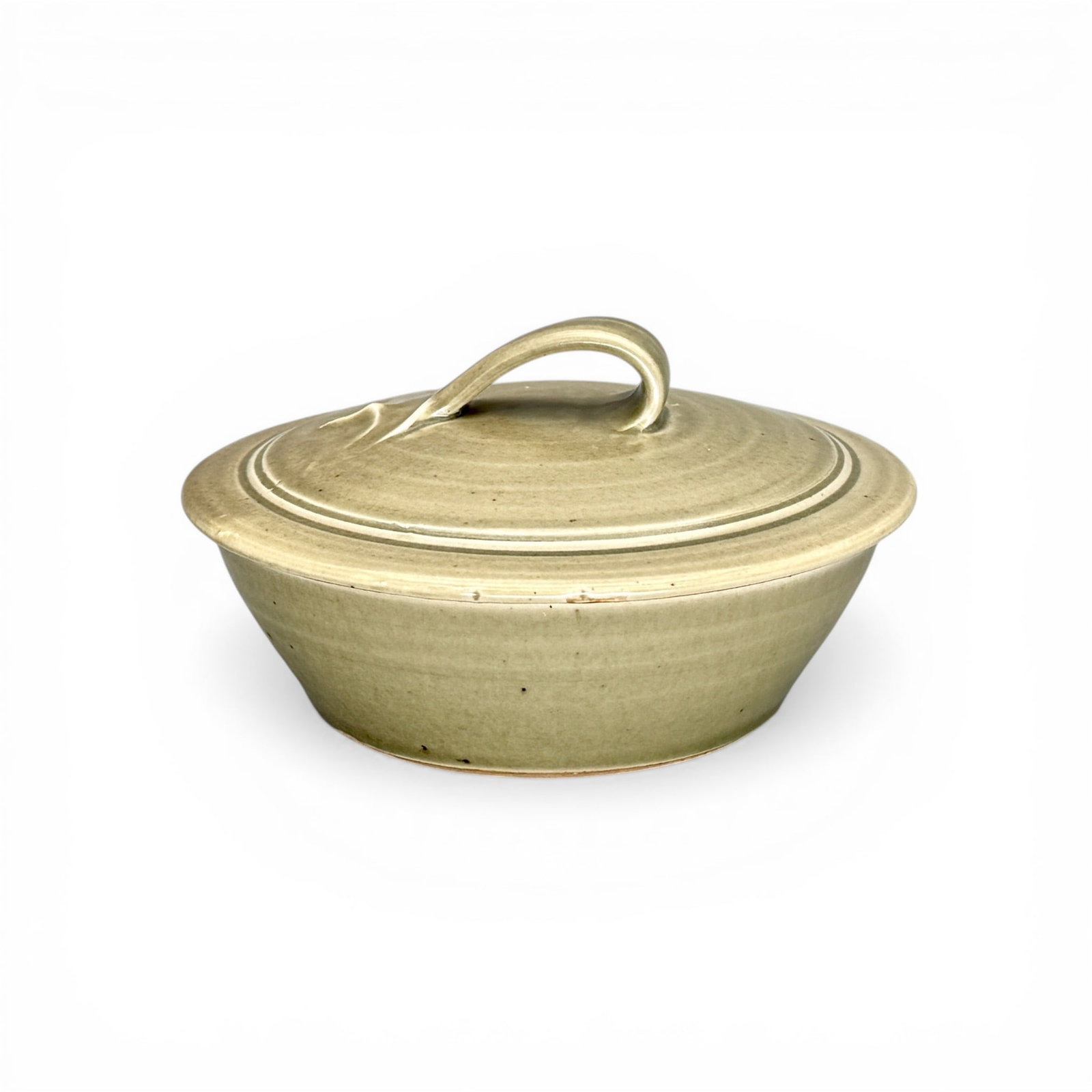 Bernard Leach Covered Bowl: Covered bowl with lid, in green matte glaze. Signed with artists cipher to rim of base. Height: 3.5", diameter: 6.25"