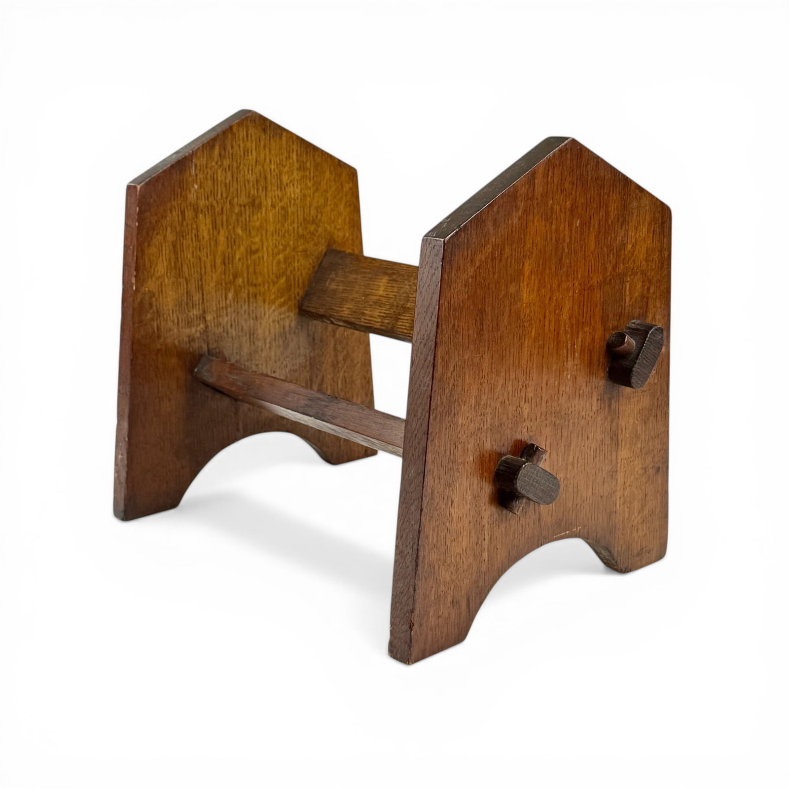 Arts & Crafts Oak Book Rack: Early 20th century, a low oak book rack with two slats. Ht. 12", lg. 13", wd. 10".