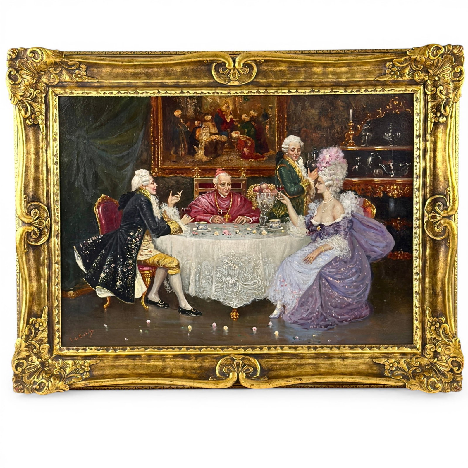 Interior Genre Oil by E. De Cozdoba: Likely Spanish, early 20th century oil on canvas. Signed l.l., and depicting a cardinal among women at a table. Housed in elaborate gilt and gesso frame. 19" x 27" (sight), 25" x 33" (framed).