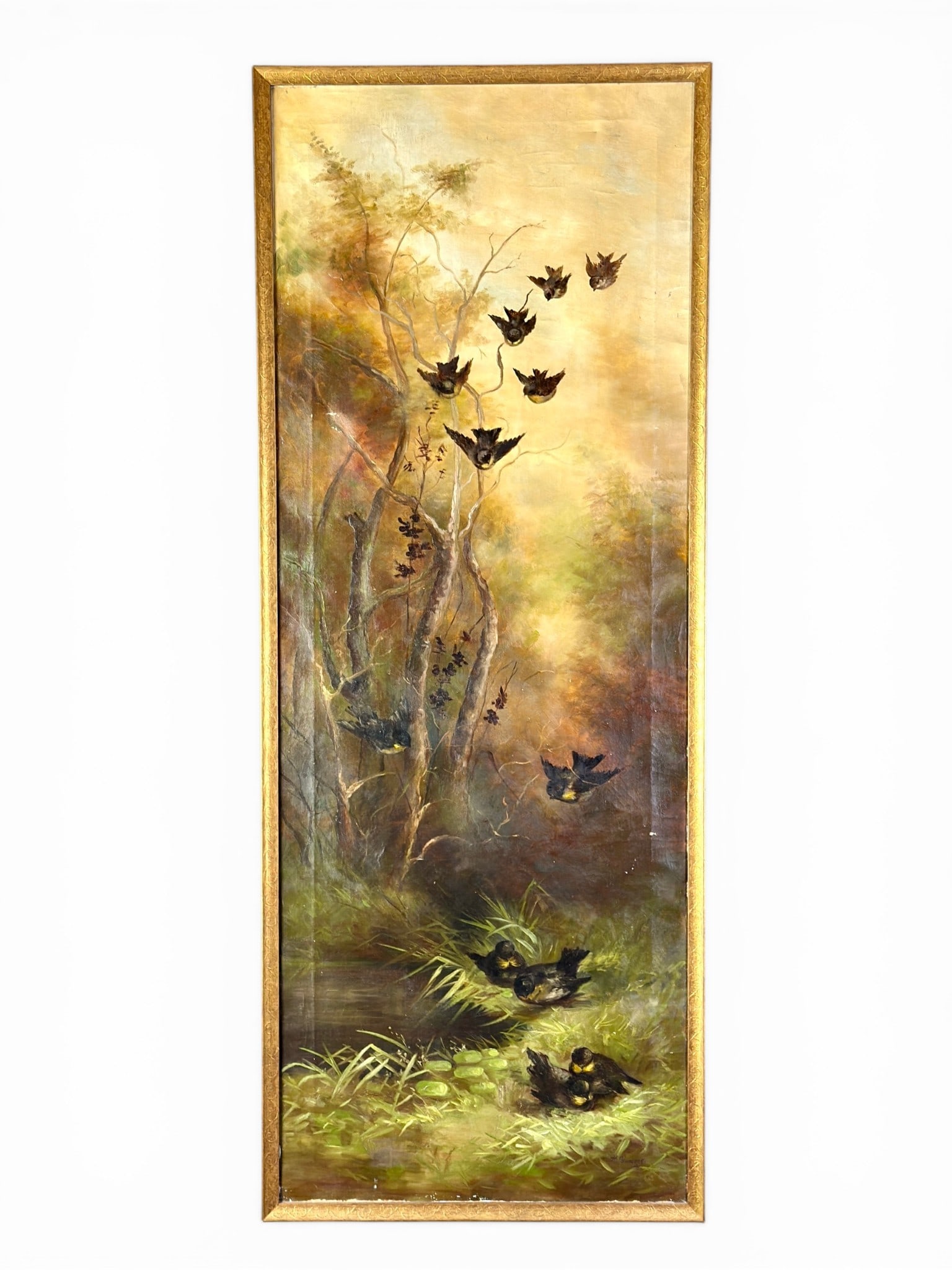 Decorative Oil Painting of Birds: Ca. 1900, an unsigned oil on canvas work in vertical size, depicting birds in a forrest. 49" x 19" (framed).