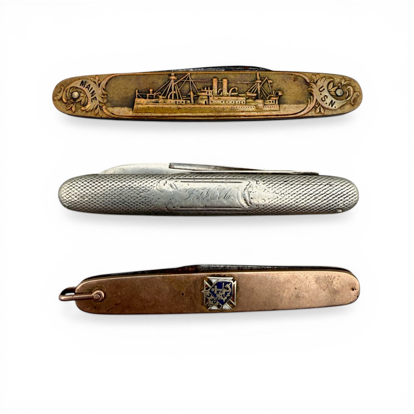 Three Antique Pocket Knives: Including 2 gold plated and one silver.