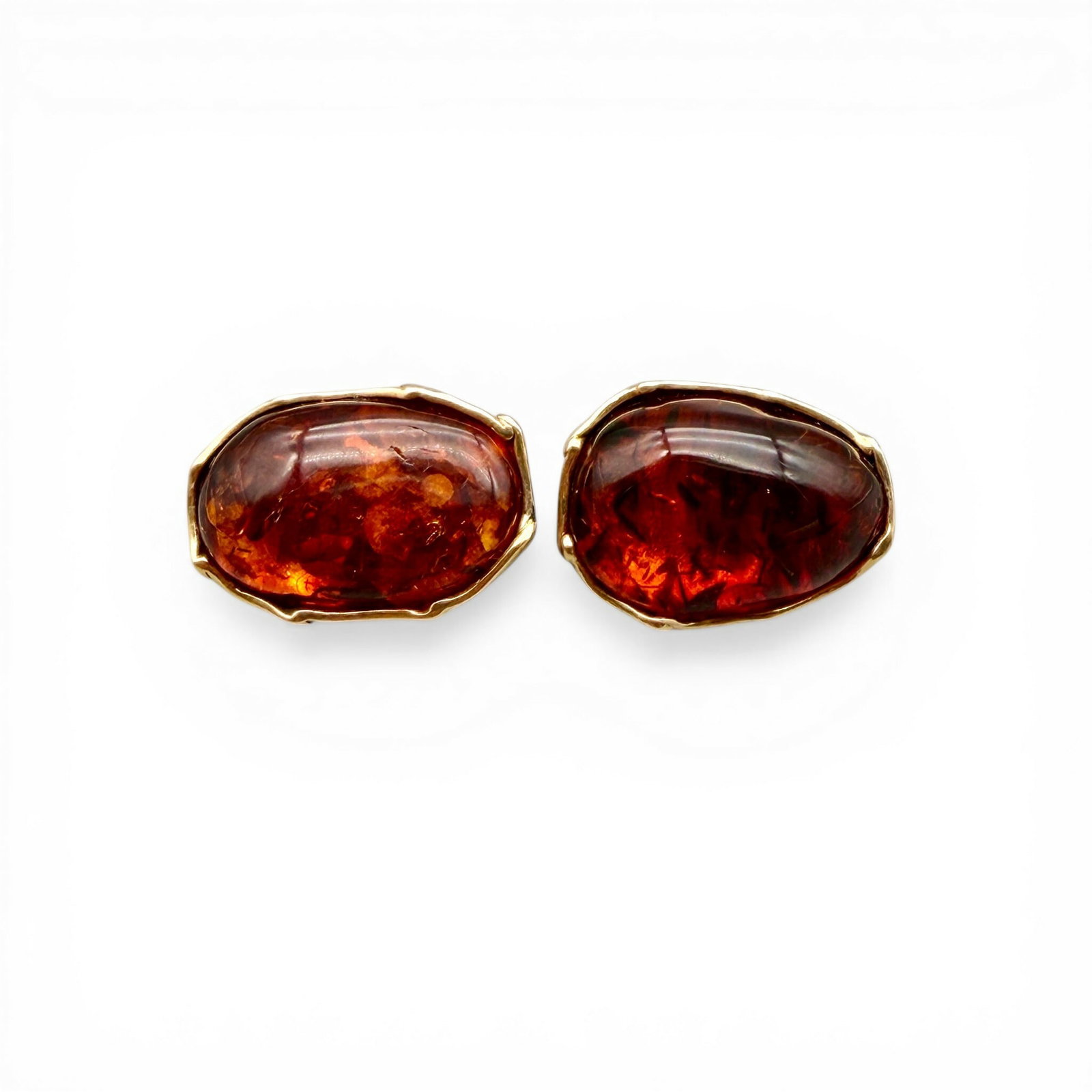 Vintage 14K Gold and Amber Earrings: 14K gold setting earrings with matching amber stones. Total weight, 14.1 grams. With 2017 appraisal, see images for more item detail.