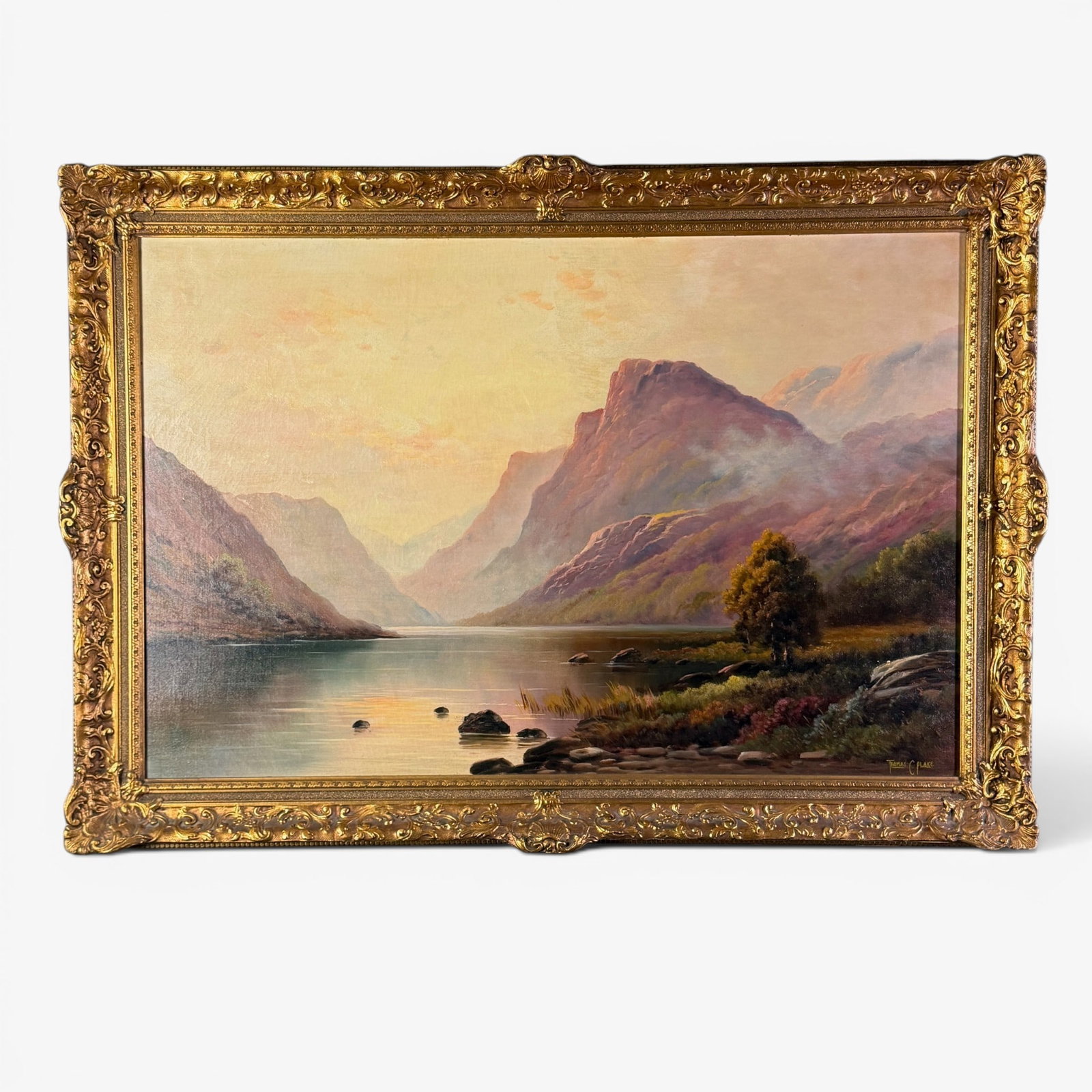 Thomas C. Blake (1890 - ) "Highland Sunset" oil on canvas.: Thomas C. Blake (1890- ) British, American, Oil on canvas entitled "Highland Sunset" showing a loch in brilliant sunlight Sight size is 23 1/4 by 35 1/4 inches. With older handsome frame, size is 29 b