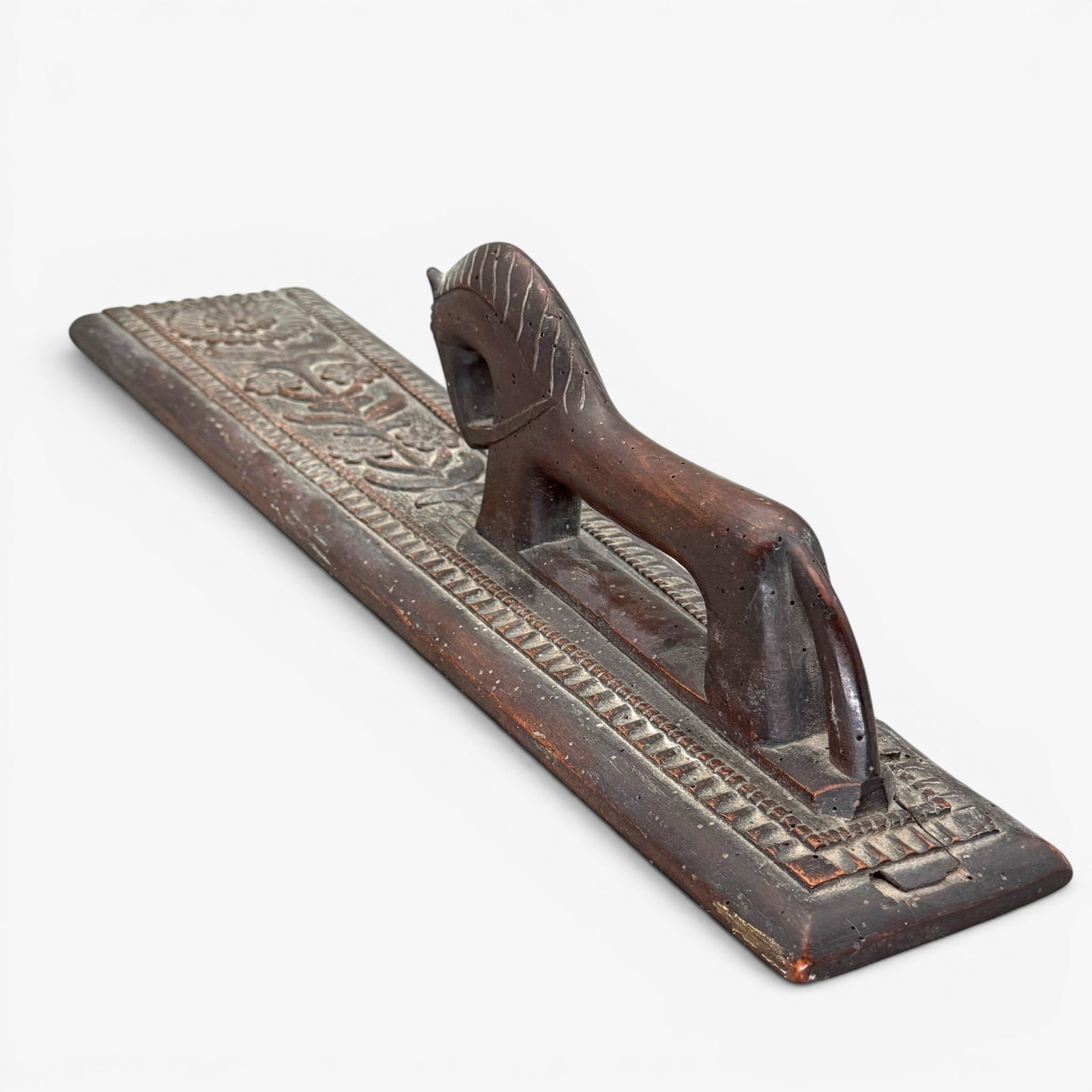Danish Folk Art Carved Mangle: With horse handle, floral patterned design. Lg. 24".