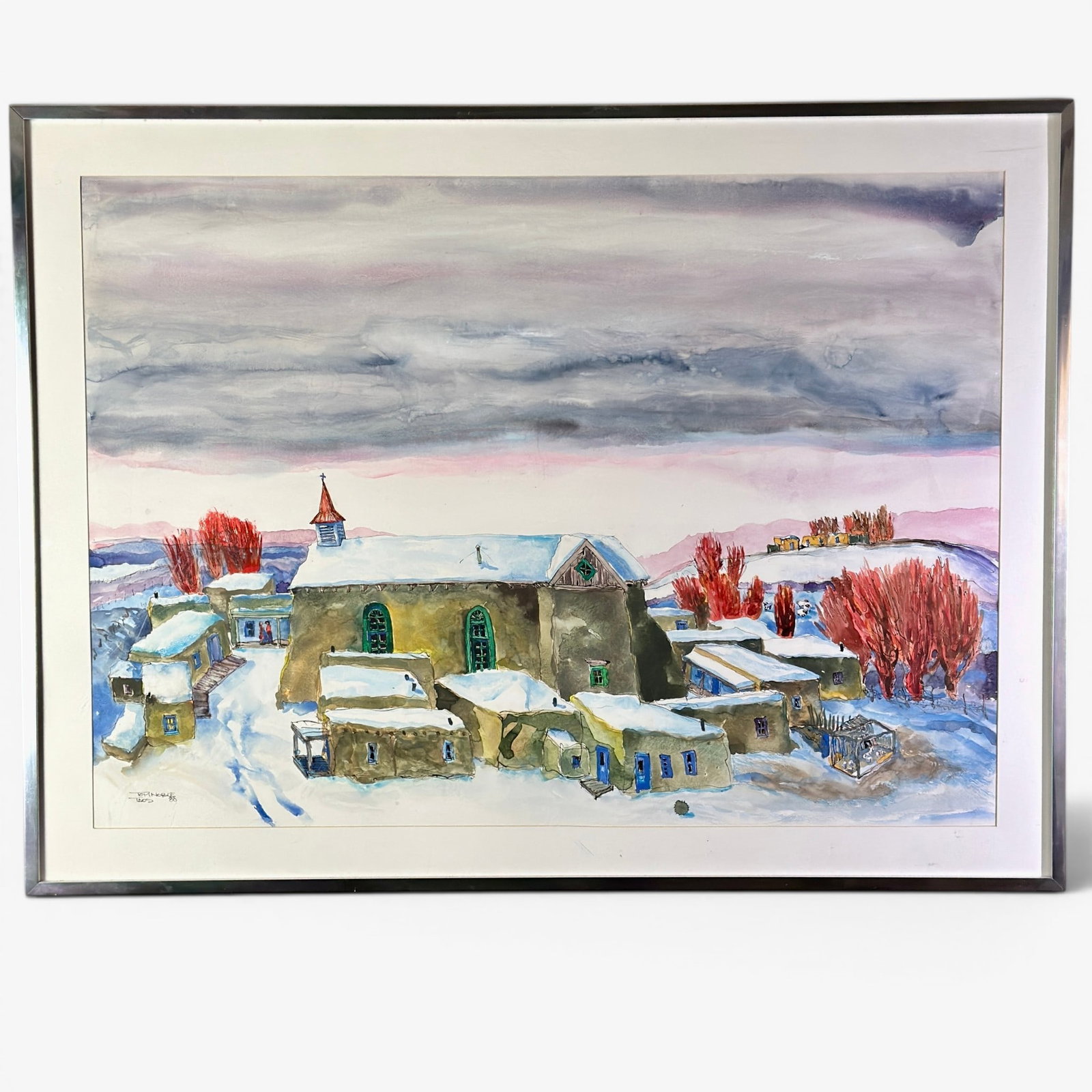 Tom Noble 1988 Taos Watercolor: A large Taos winter scene by Tom Noble, ink and watercolor on paper. Signed and dated to the lower left. Sight size: 30" ht. x 42" wd., framed size: 36.5" ht. x 48" wd.