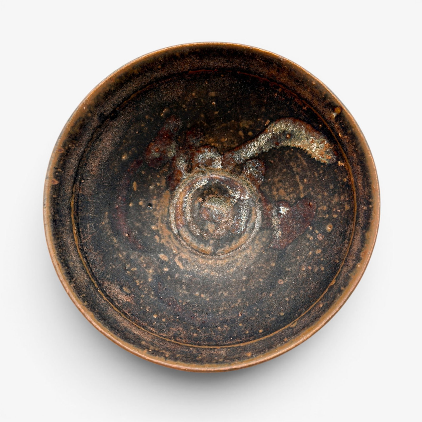 Song/Yuan Jian Ware Tea Bowl: Song/Yuan Dynasty. A spotted ware tea bowl, with light spotting to interior and exterior. Ht. 2", diameter 4.5". PROVENANCE Private Collection, Columbus OH Collected from sources in Southeast and