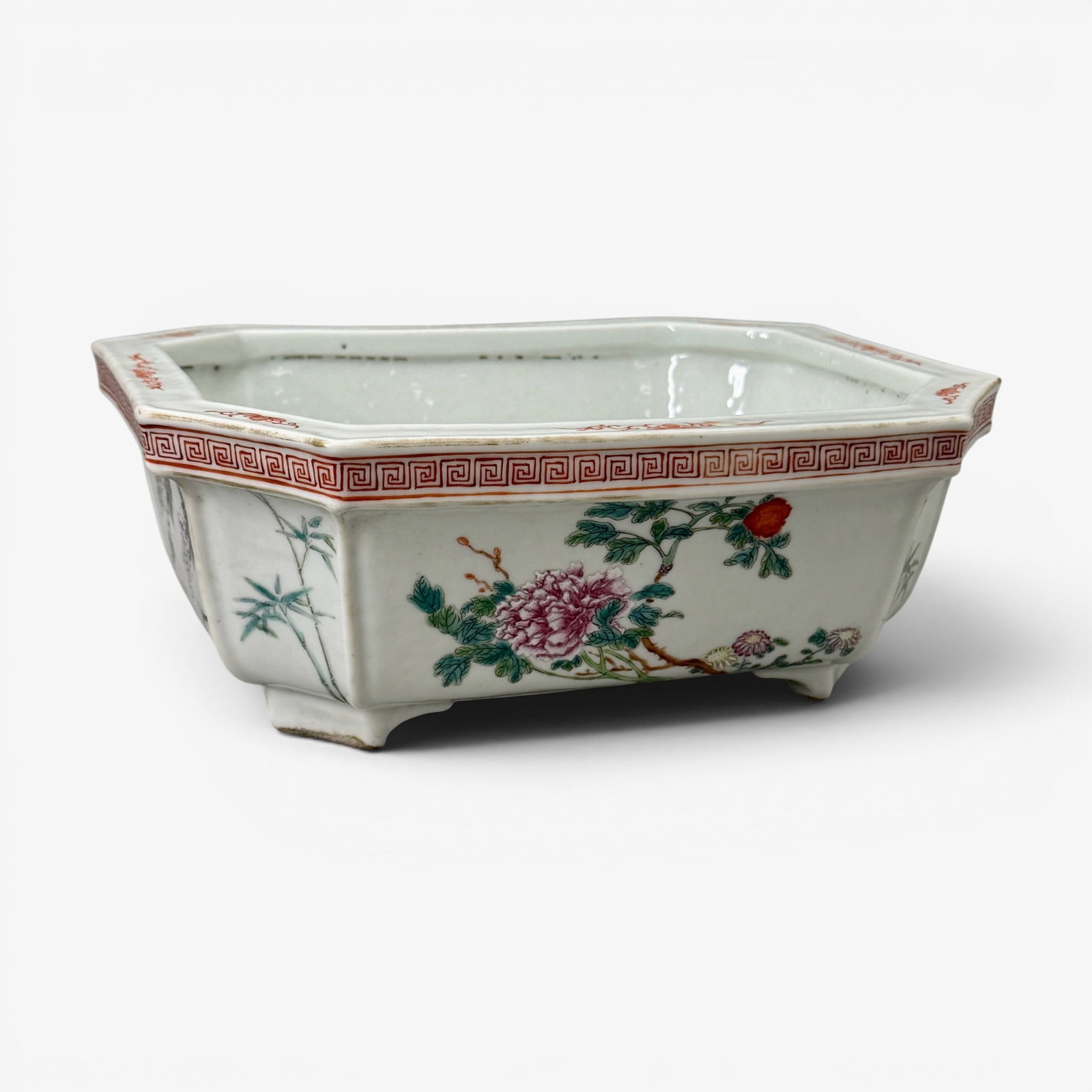 Chinese Republic Period Planter: Famille Rose, early 20th century, well decorated to the body in floral sprays, scrollwork border, orange peel surface to interior, and marked for "Jingdezhen" to underside. Lg. 10", ht. 4".
