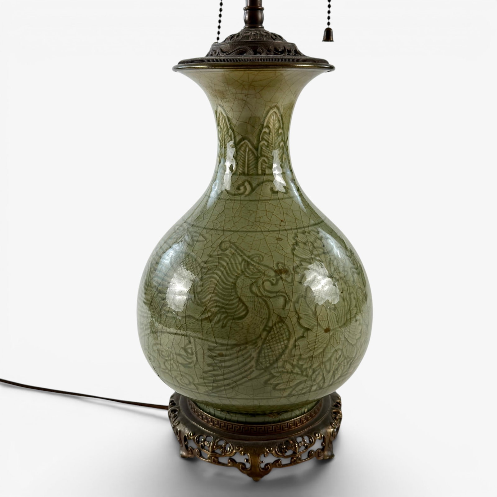Chinese Celadon Lamp: Chinese, in the manner of Song Dynasty porcelains, but likely 19th century. Outfitted for a lamp, ormolu base in Chinese design with ruyi feet. Ht. 22" (total).
