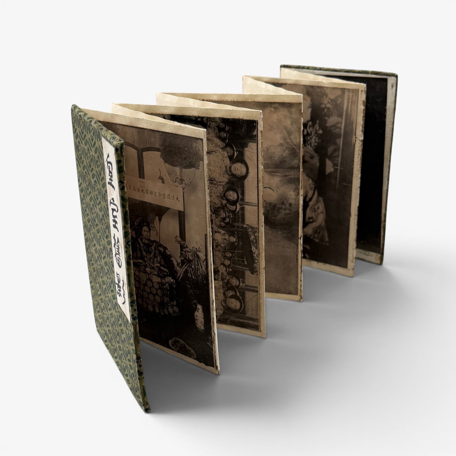 Photograph Album of Empress Dowagher and Puyi: Early 20th century, a bound photograph album with the Empress Dowager and Puyi, several photographs. 6" x 4".