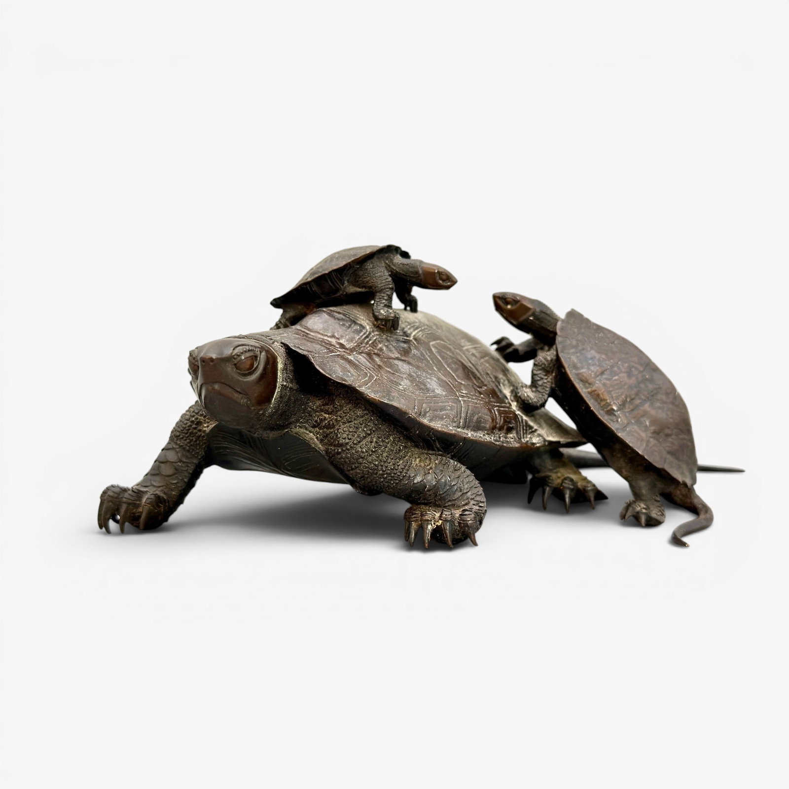 Japanese bronze of turtles, Meiji period okimoo.: Beautifully detailed Japanese bronze of adult turtle and two babies, Meiji period. in the style of Nogami Tatsuoki (1865-1932) Chop mark on underside. Height 2 3/4 inches, length 5 7/8 inches.