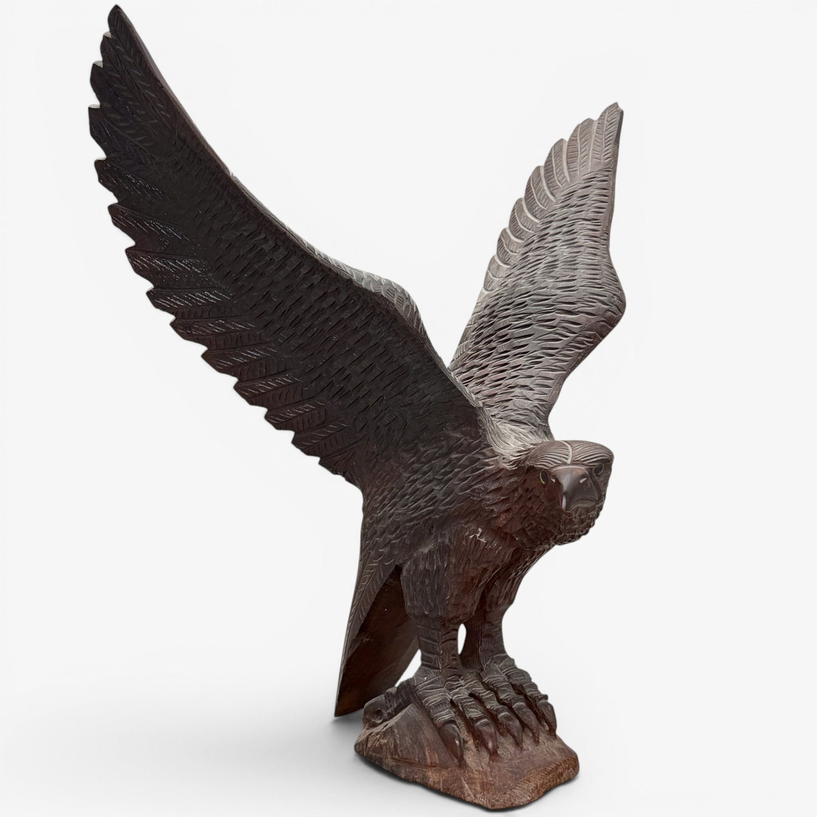 Folk Art Carved Eagle: Spread wings, on rocky plinth. Ht. 20".