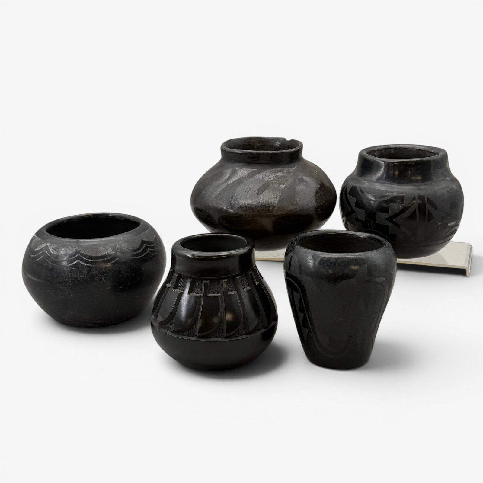 Five Blackware Vessels, Including Santa Clara: Including two clearly signed Santa Clara examples, and 3 others with indistinct inscriptions. Tallest ht. 4.5".