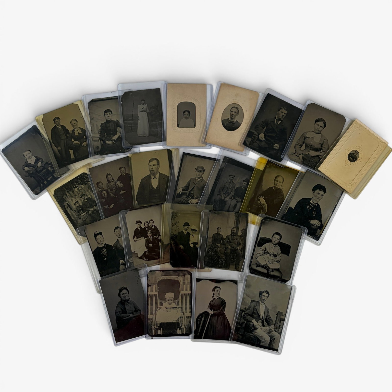 Collection of 25 Early Tintypes: None encased, however all housed in card sleeves. The vast majority depicting family images, children, etc. 25 in total