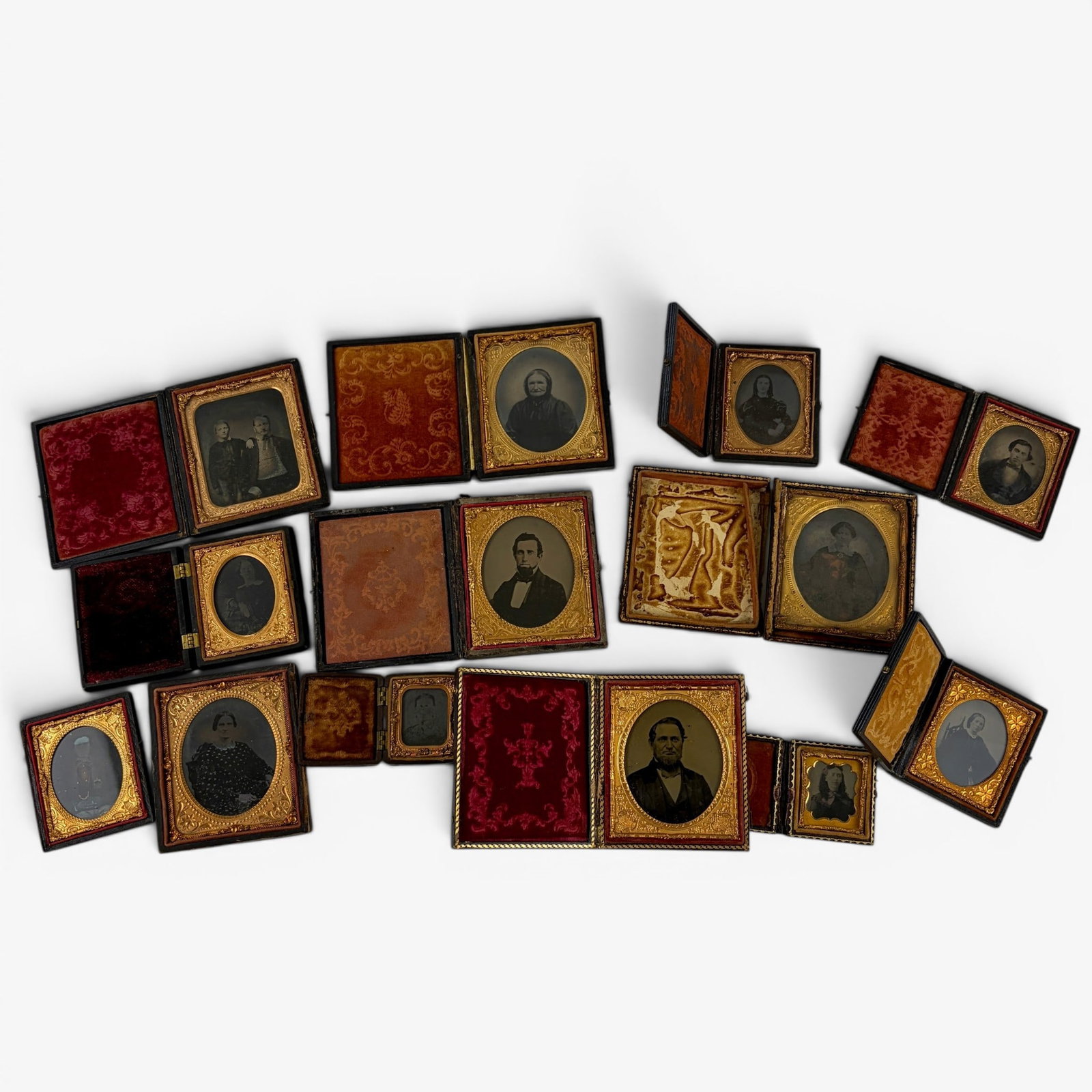 Group of Cased Tintypes/Ambrotypes: 13 images in total with some wear or loose cases. The majority are tintypes depicting unknown individuals / family photography