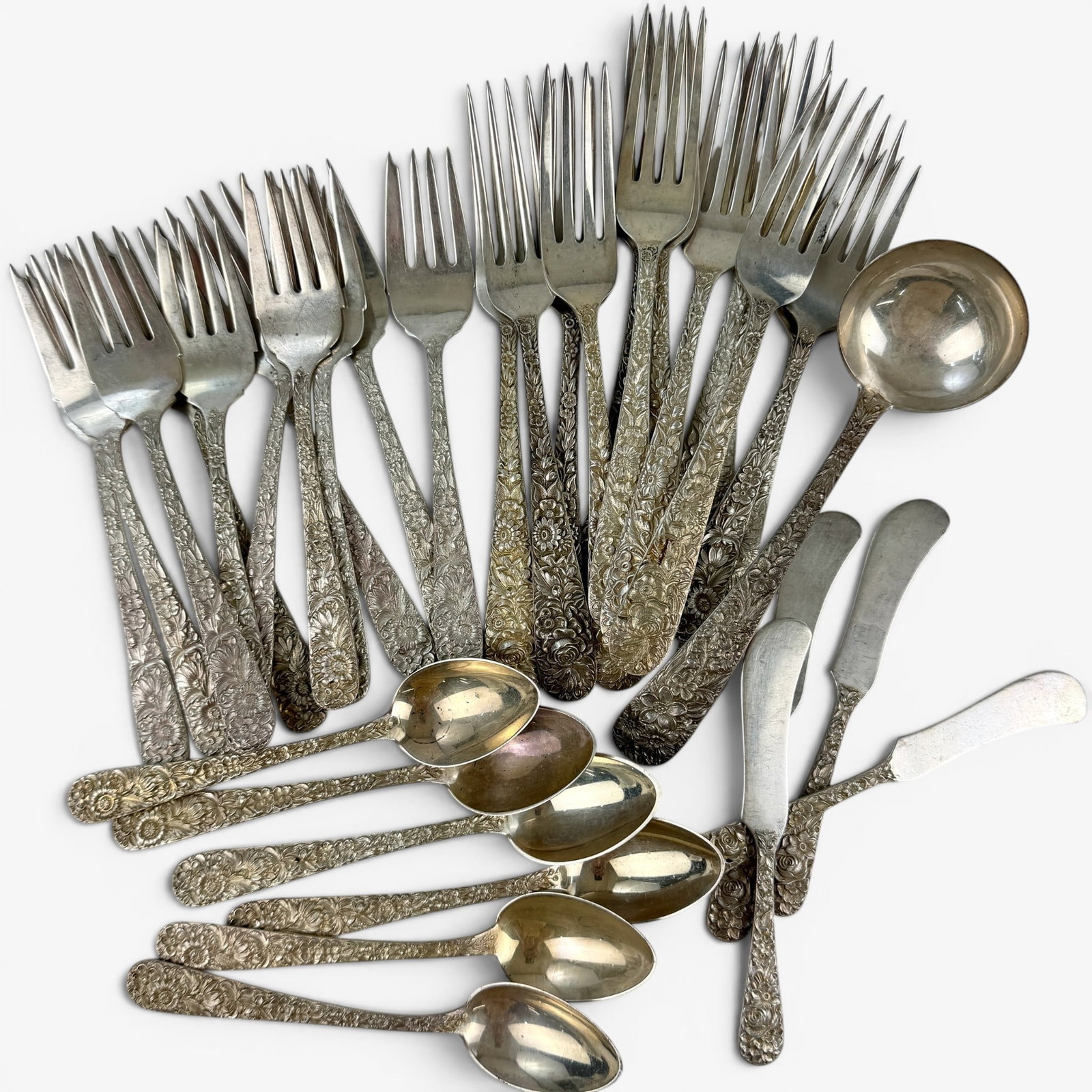 Kirk & Sons Sterling Flatware Set: All repousee, including 6 spoons, 12 salad forks, 12 forks, 4 butter knives, and one ladle. Total weight 46.07 ozt.