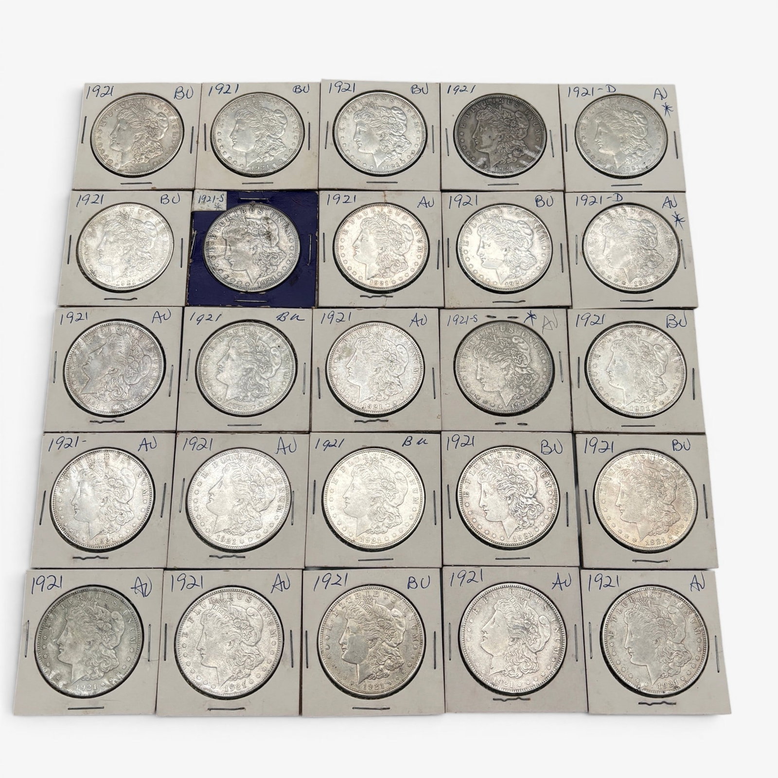 Collection of Twenty Five 1921 Morgan Dollars: All housed in collector's holders, varying mints and varying states of condition