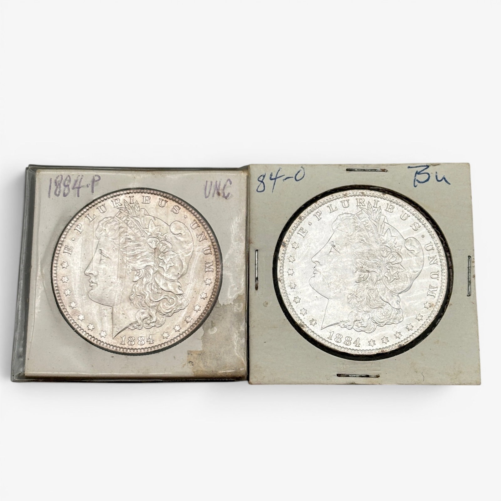 Pair of 1885 Morgan Silver Dollars: One New Orleans mint 1884 silver dollar and one Philadelphia 1884 silver dollar. Both coins with nice luster