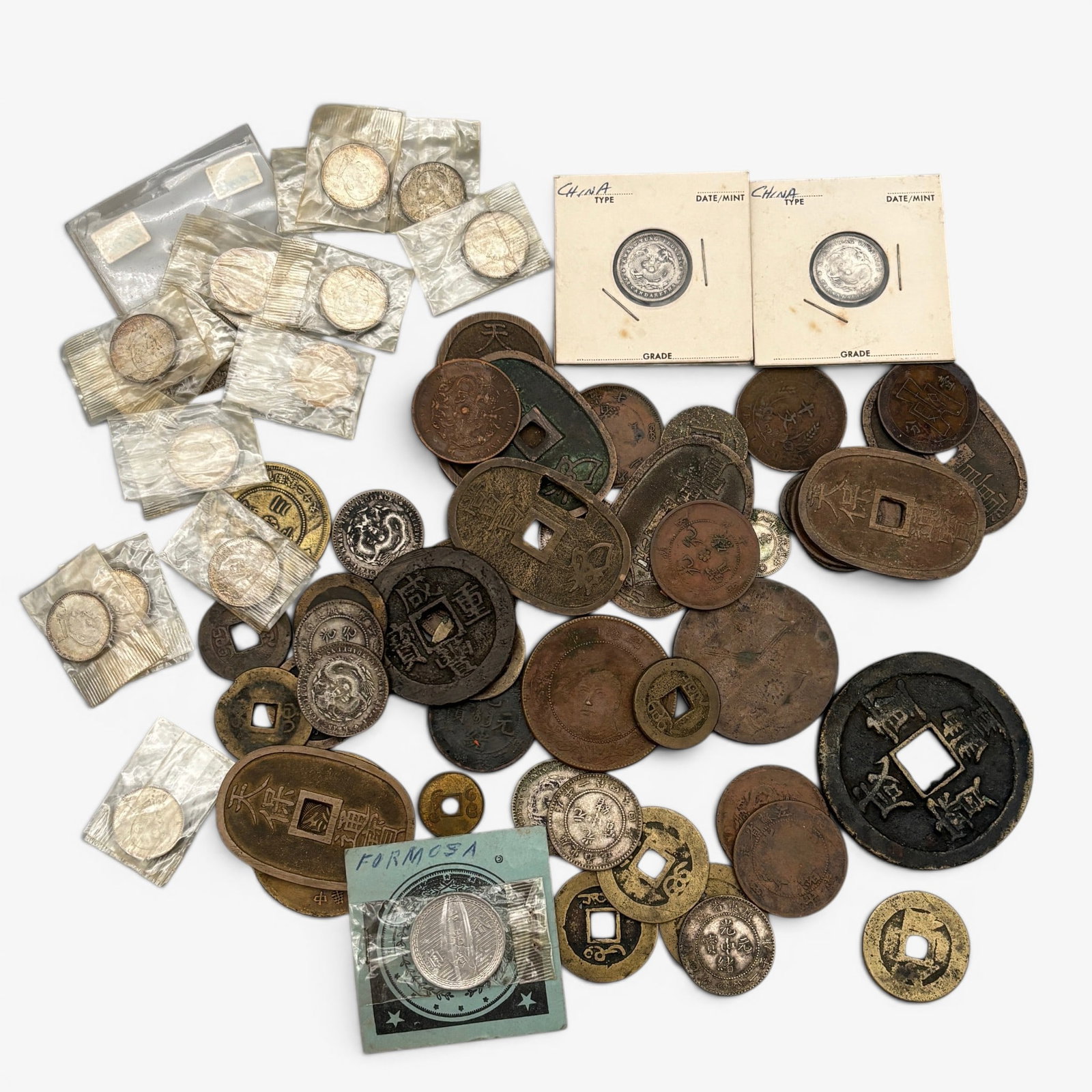 Collection of Early Chinese Coinage: Including examples from the Edo, Sung and other periods. Kwangtung Province coins among others. Additional examples from the late 19th and early 20th centuries.