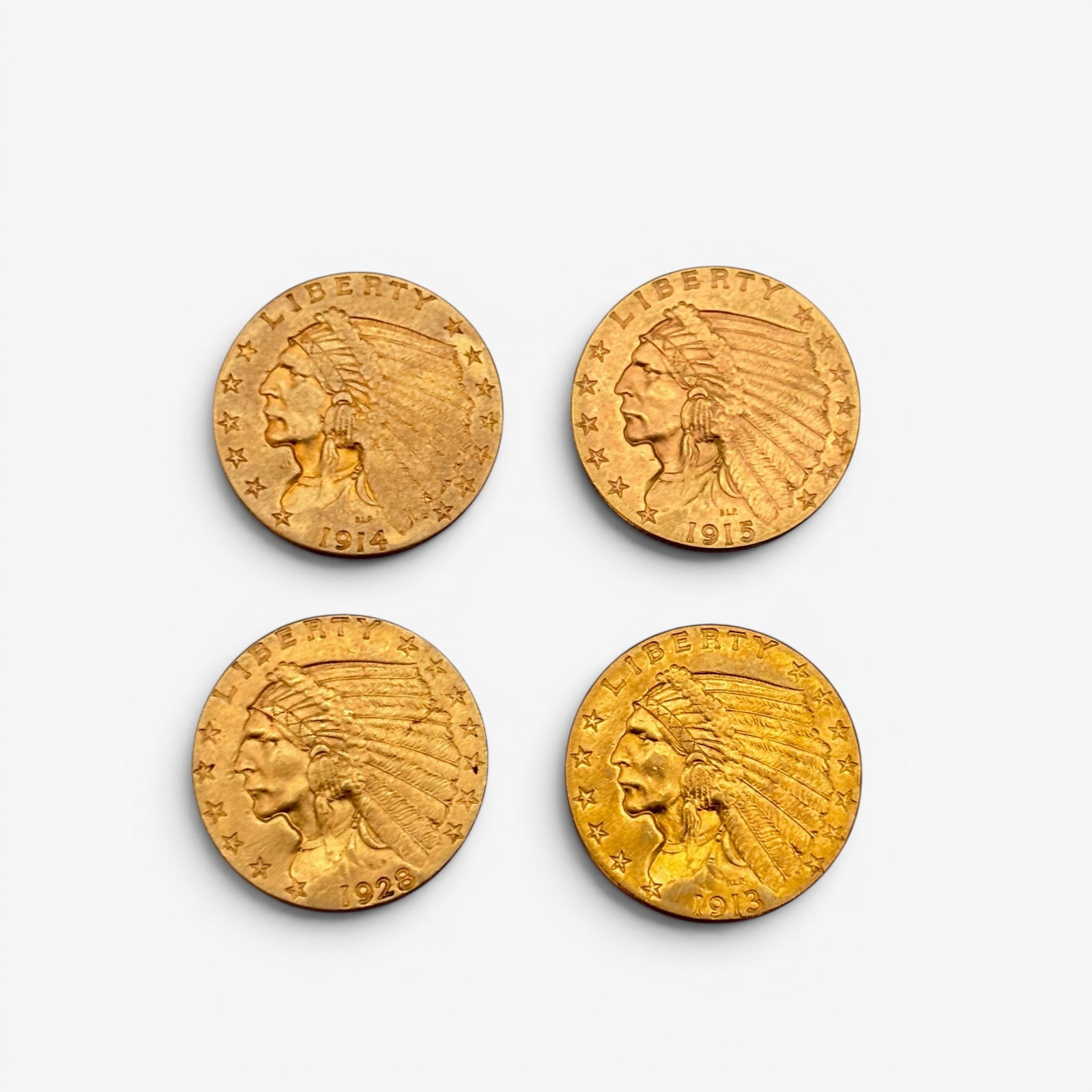 Four $2.5 Dollar Indian Head Gold Coins: Dates are 1913, 1914, 1915 and 1928