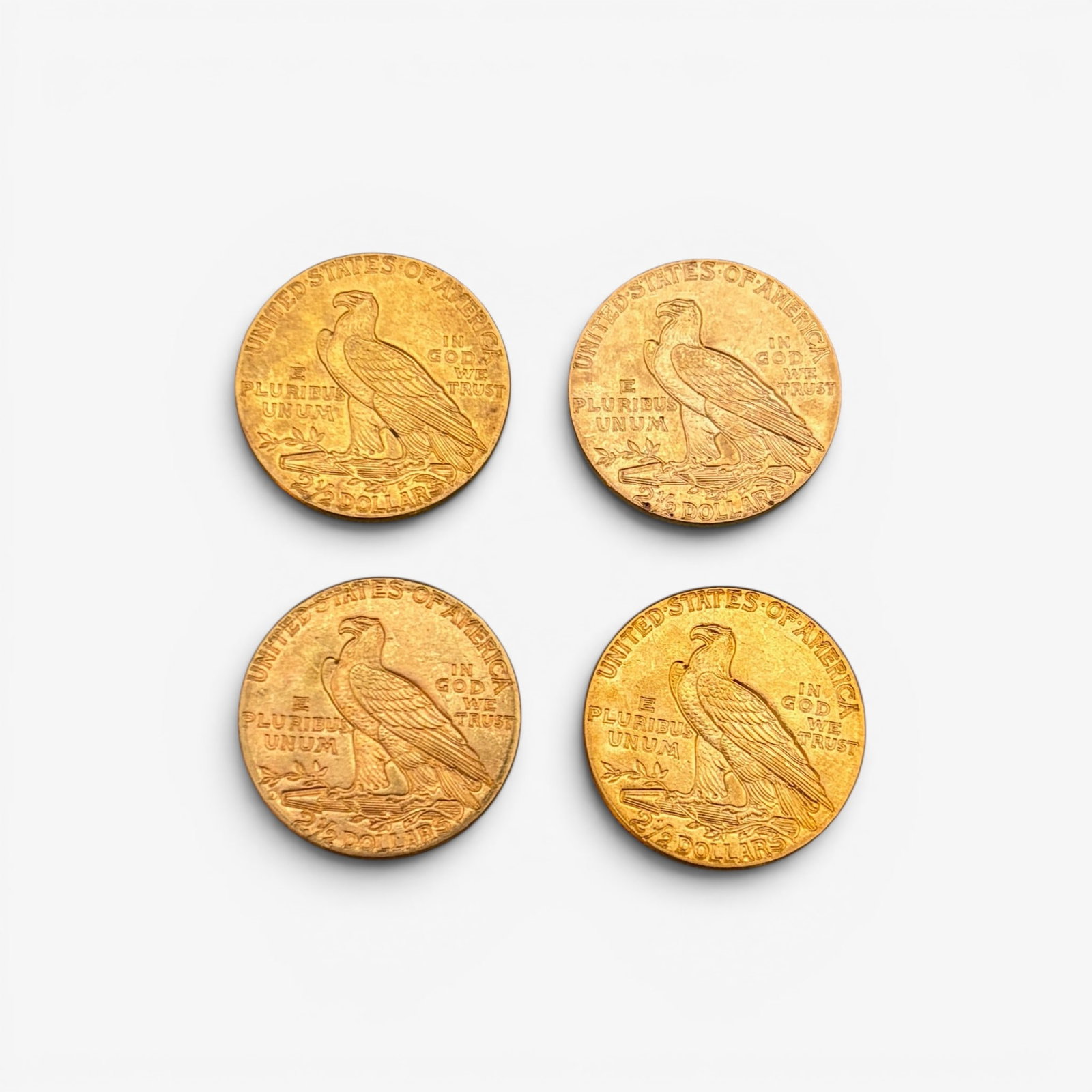Four $2.5 Dollar Indian Head Gold Coins: Dates are 1913, 1914, 1925 and 1928