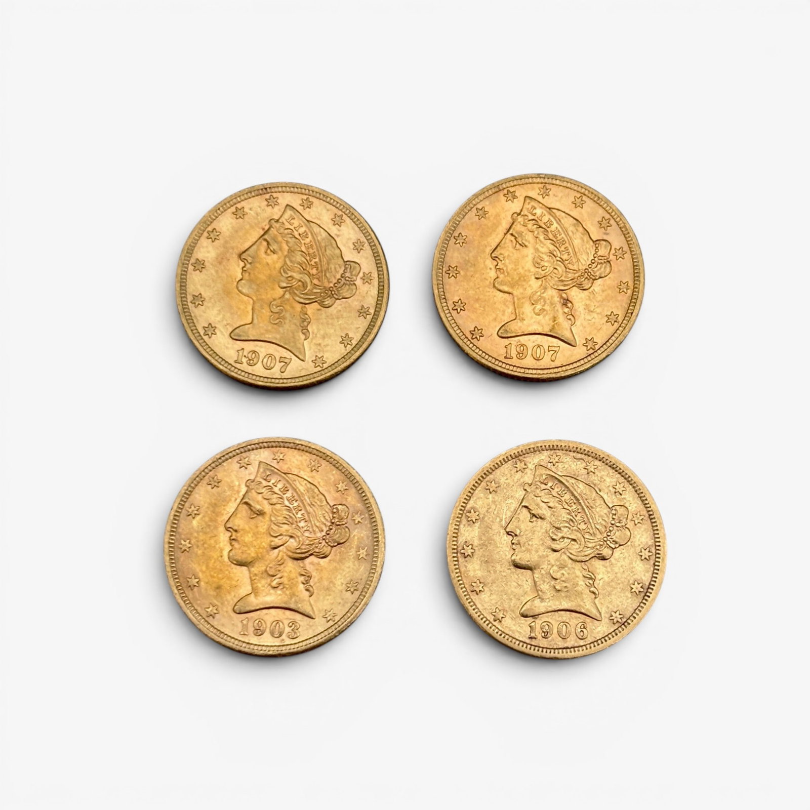 Four 1900's $5 Liberty Gold Pieces (1 of 1)