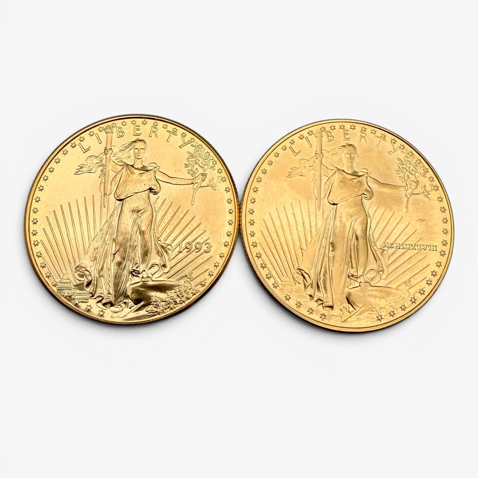 Two 1993 One Ounce Fine Gold American Eagles: Flowing liberty one ounce fine gold coins, dated 1993. Both in good condition.