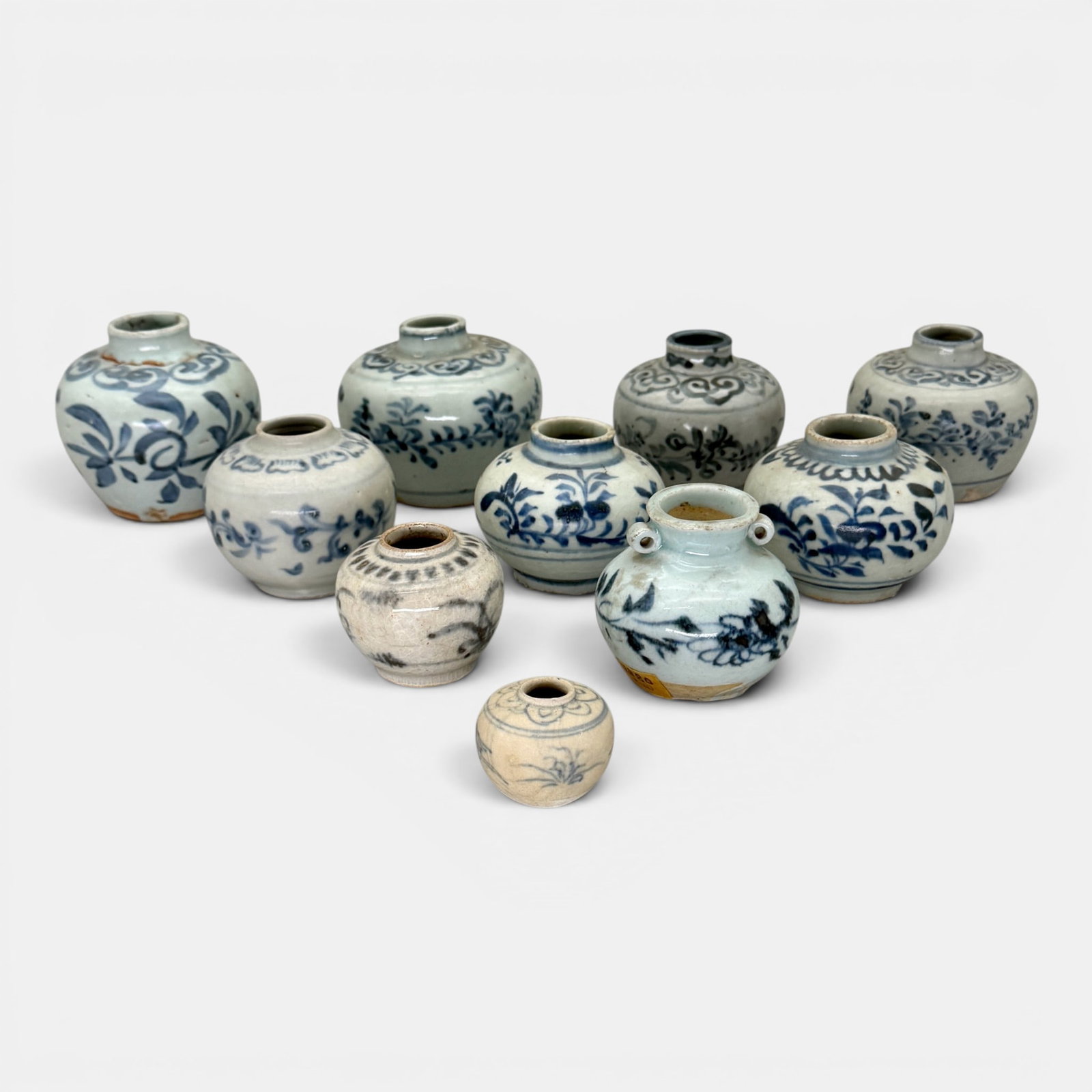 10 Blue and White Jars, Yuan/Ming: Yuan/Ming, a collection of ten blue and white decorated jars. Tallest ht. 3".