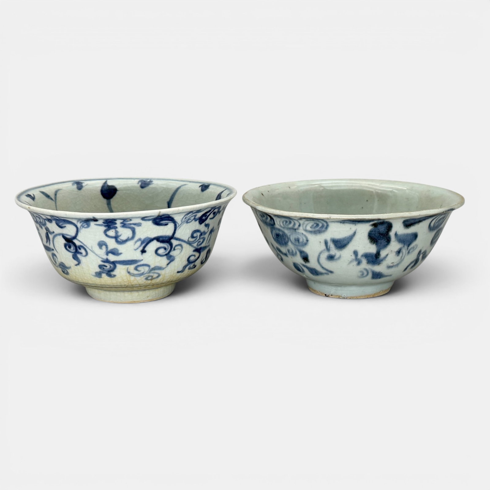 Pair of Ming Blue and White Bowls: Each with blue underglaze decoration, one with considerable interior decoration. Ht. of each 2.5", diameter 6".
