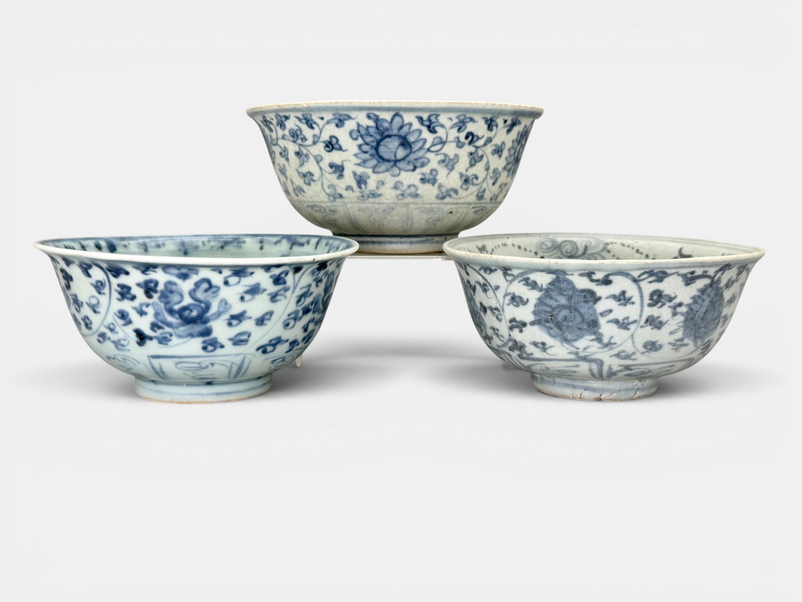 Three Ming Blue and White Bowls: Each with substantial body and interior patterned decoration. Largest ht. 3", diameter 6.5".