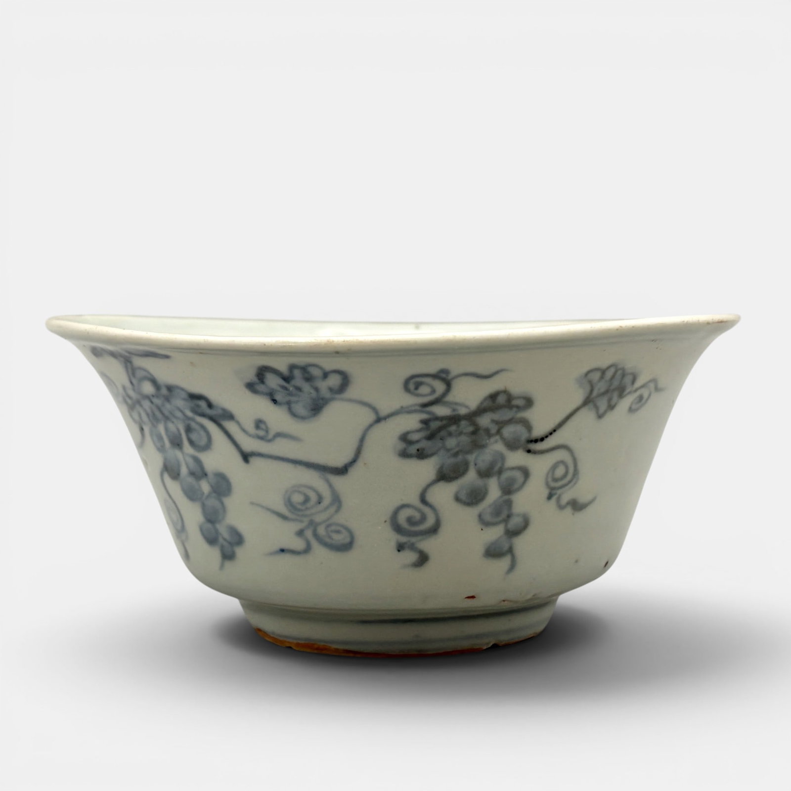 Ming Blue and White Bowl: Ming dynasty, decorated in underglaze blue with florals to interior base and exterior. Diameter: 5.25"