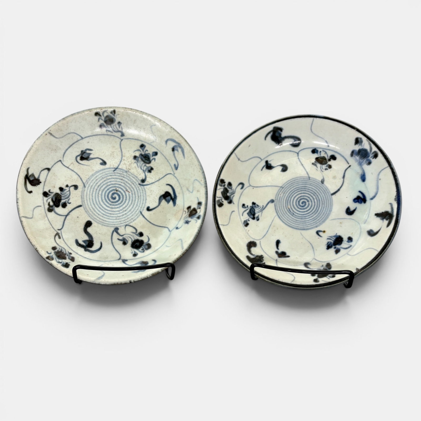 Pair of Ming Blue and White Dishes: Both with similar decoration, swirling pattern to interior and vines/florals. Diameter of each: 7"